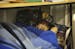 Having slept poorly the night before and arrived to a cold classroom Bug-O-Nay-Ge-Shig High School student Irvin Kingbird, a senior, curled up with a 