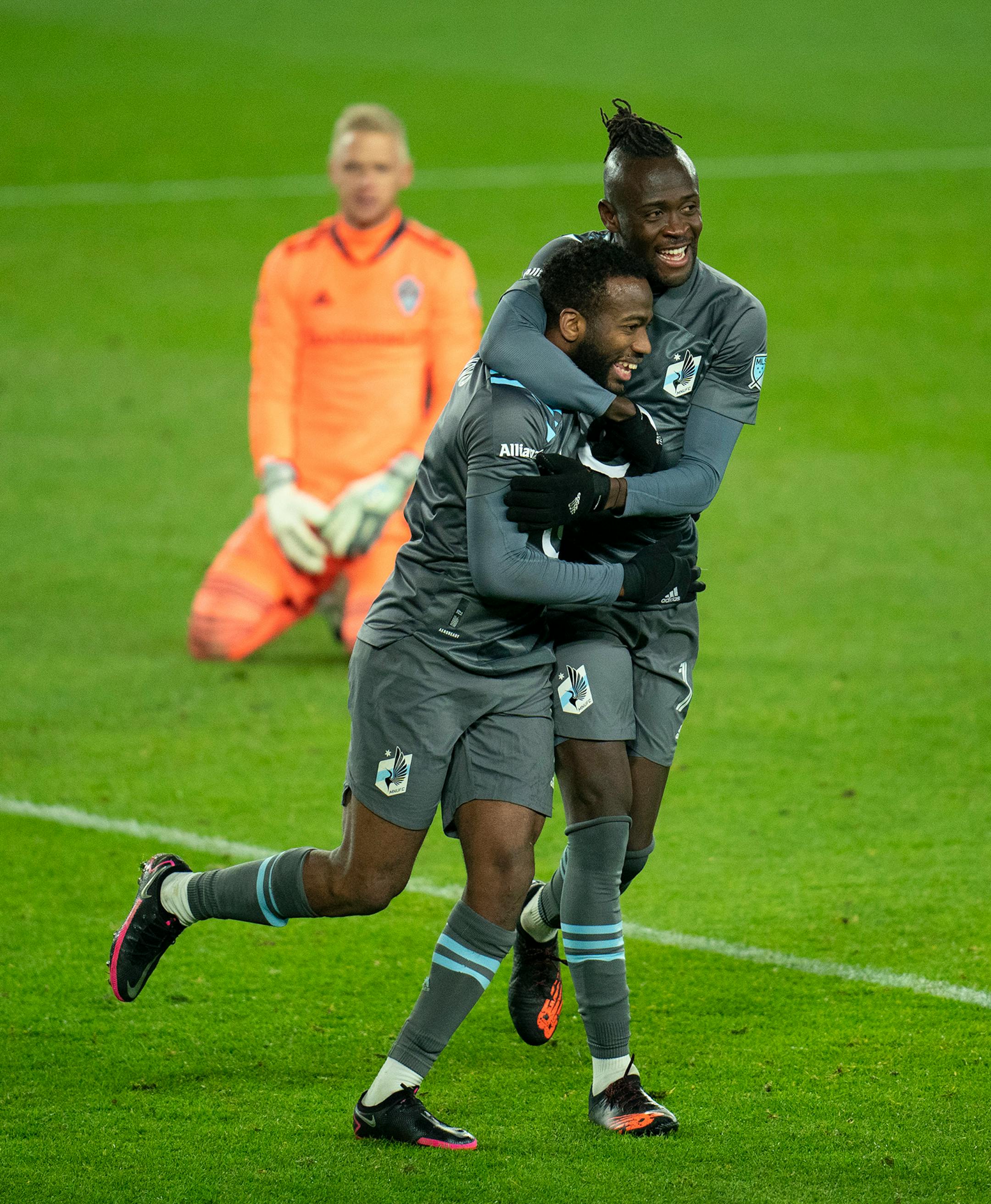 Minnesota United midfielder Kevin Molino (7) celbrated his second goal of the game with teammate forward Kei Kamara (16) after beating Colorado Rapids goalkeeper William Yarbrough (50).