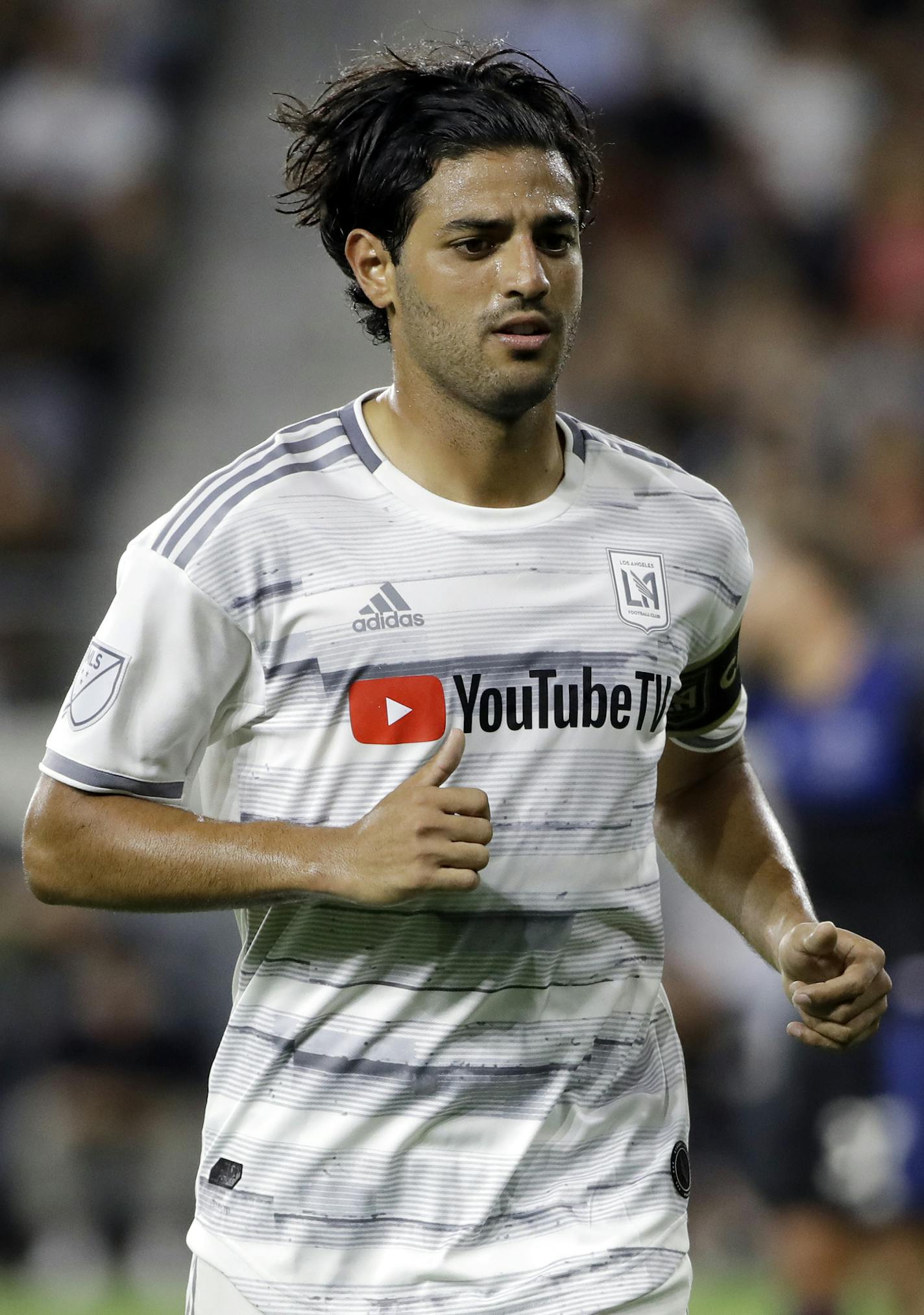 Los Angeles FC forward Carlos Vela in action against the San Jose Earthquakes during the second half of an MLS soccer match Wednesday, Aug. 21, 2019, in Los Angeles. (AP Photo/Marcio Jose Sanchez)