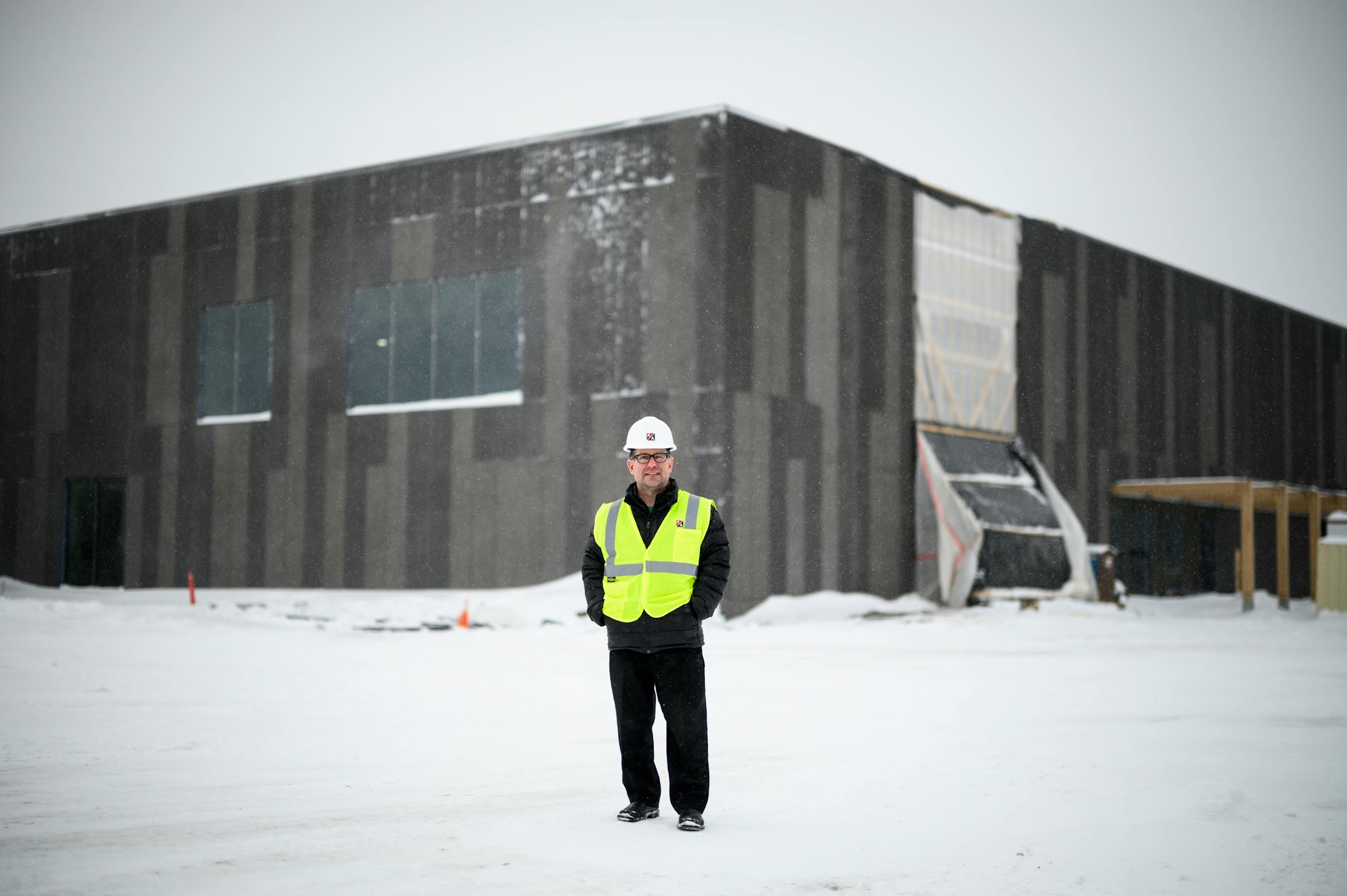 Willie Spelts, Rock Ridge fundraising coordinator and director of school to work engagement, stands for a portrait in front of the school Feb. 22, 2022. Spelts is the former athletic director at Virginia High School and former elementary school principal.