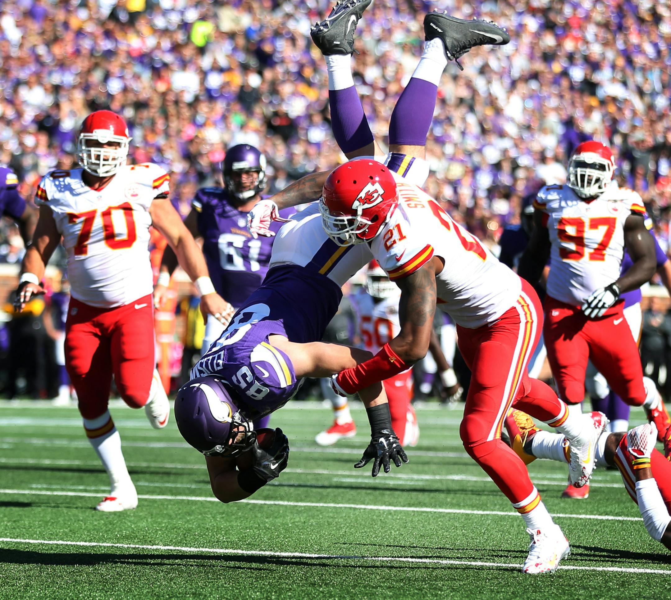 Minnesota Vikings tight end Rhett Ellison (85) jump over Kansas City Chiefs cornerback Sean Smith (21) for a first down in the second quarter at TCF Bank Stadium Sunday October 18, 2015 in Minneapolis, MN. ] The Minnesota Vikings hosted the Kansas City Chiefs Jerry Holt/ Jerry.Holt@Startribune.com