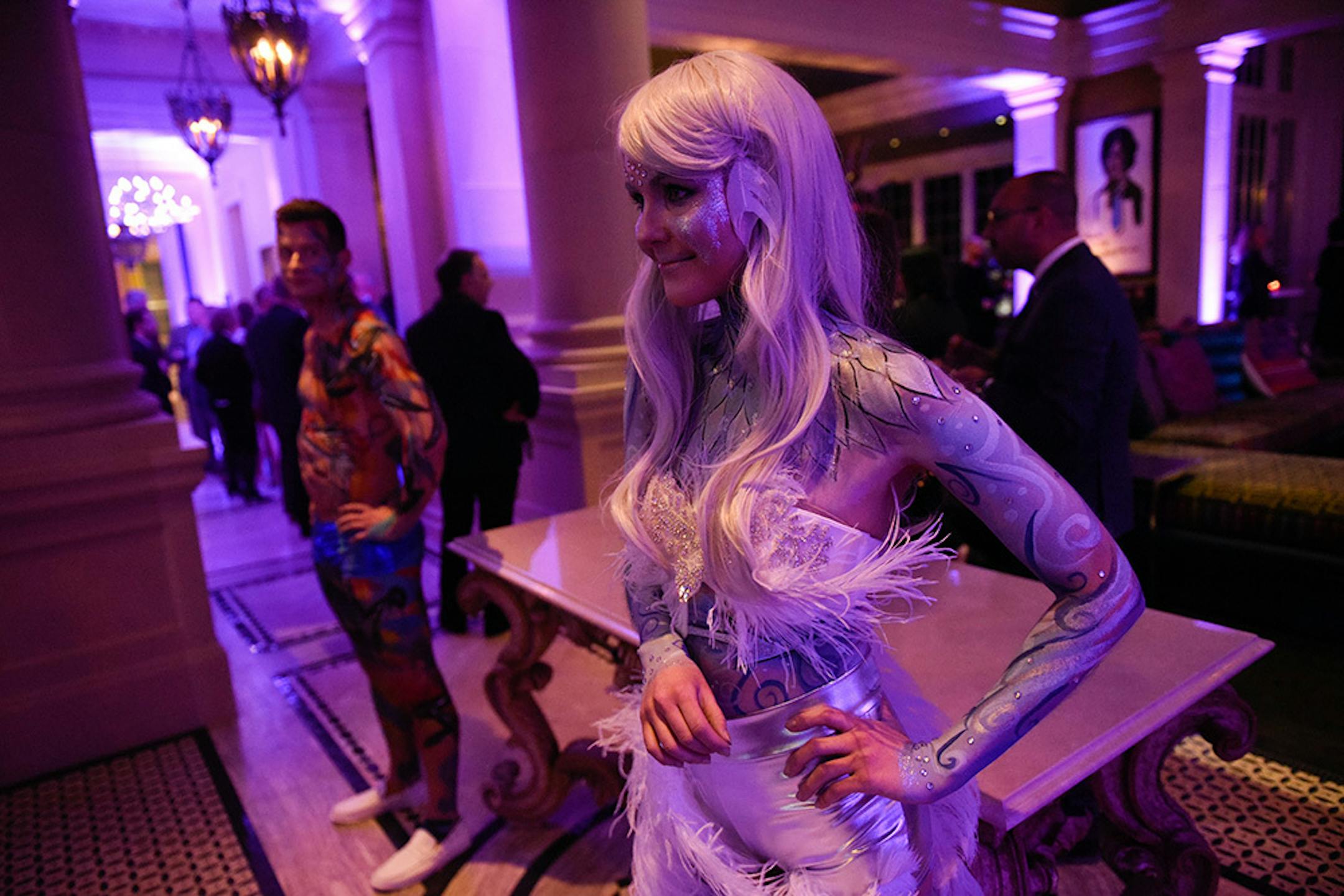 Aleysa Tatur, of Rogers, wore swan-like body art created by Elan Artists at Saturday night's party. ] AARON LAVINSKY ï aaron.lavinsky@startribune.com The Giving Back Fund's "Big Game Big Give" charity party, emceed by Jamie Foxx, was photographed Saturday, Feb. 3, 2018 in Edina, Minn.