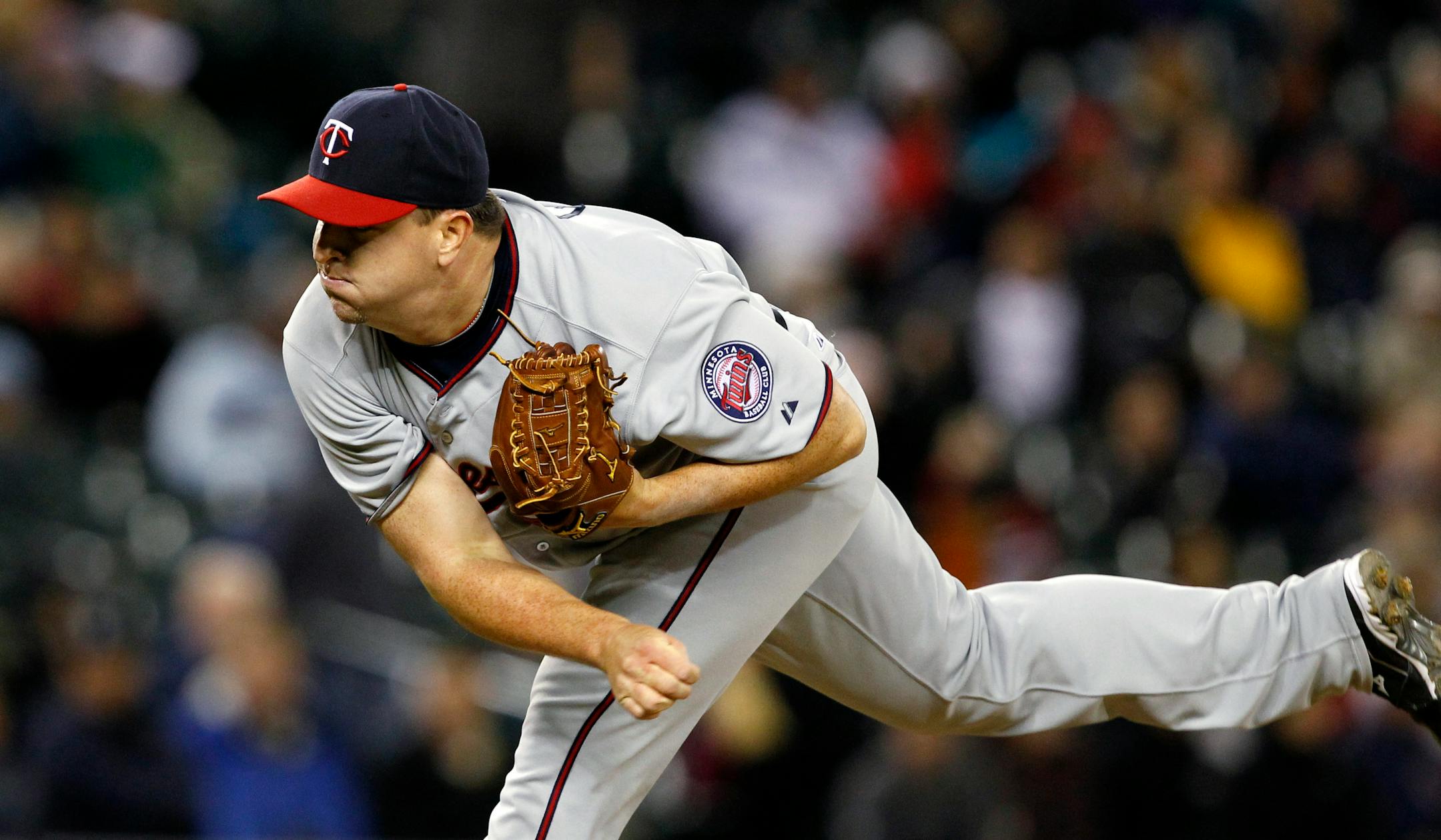 Minnesota Twins closer Matt Capps throws against the Seattle Mariners in the ninth inning of a baseball game Friday, May 4, 2012, in Seattle. The Twins won 3-2. (AP Photo/Elaine Thompson)