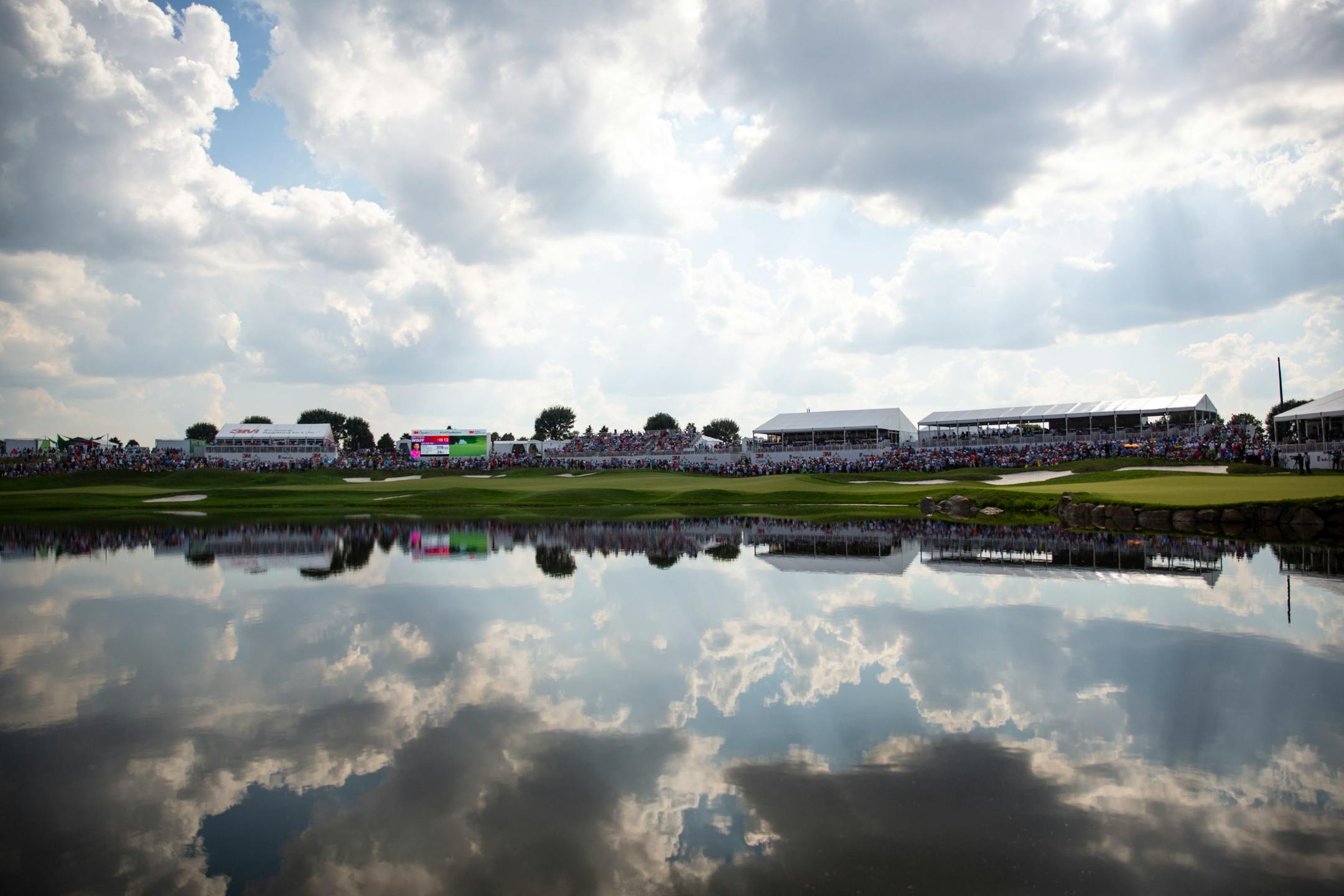 A large crowd surrounded the 18th hole during the final round of the 3M Open at TPC Twin Cities in Blaine. The tournament will be played three weeks later next year (July 23-26), according to next season's expanded PGA Tour schedule released on Monday.