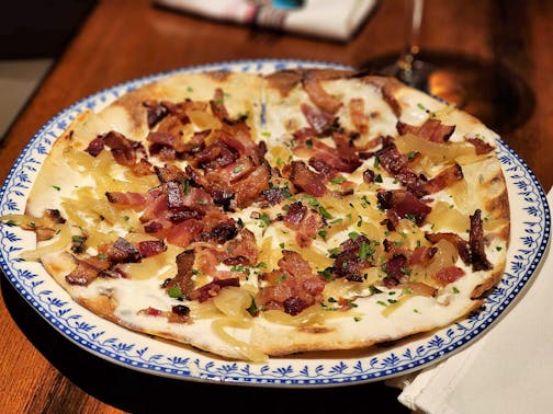 Alsatian tarte flambée at Chloe by Vincent