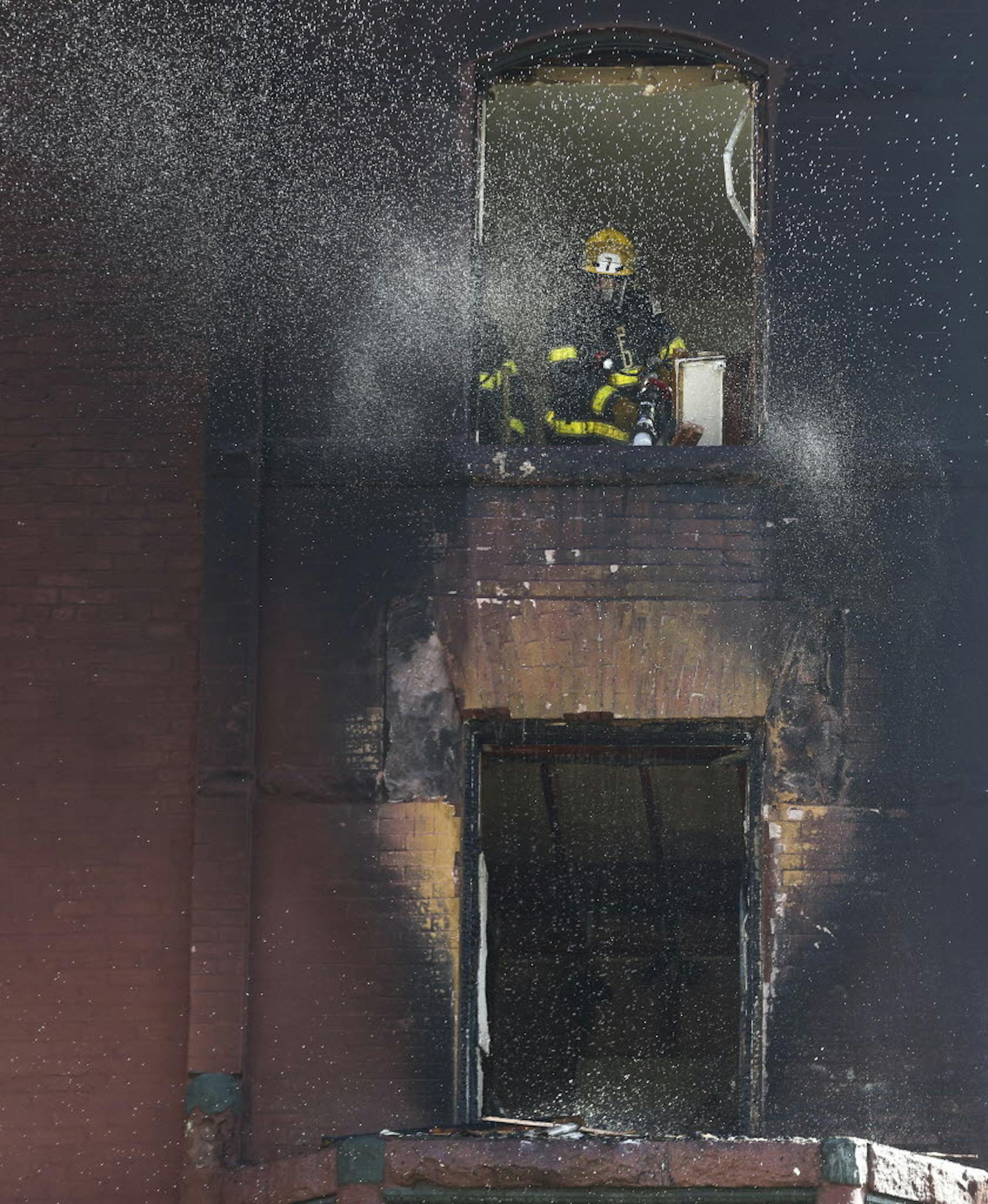 Firefighters on the scene of a downtown Minneapolis fire quieted the flames with an ample amount of water Sunday afternoon.