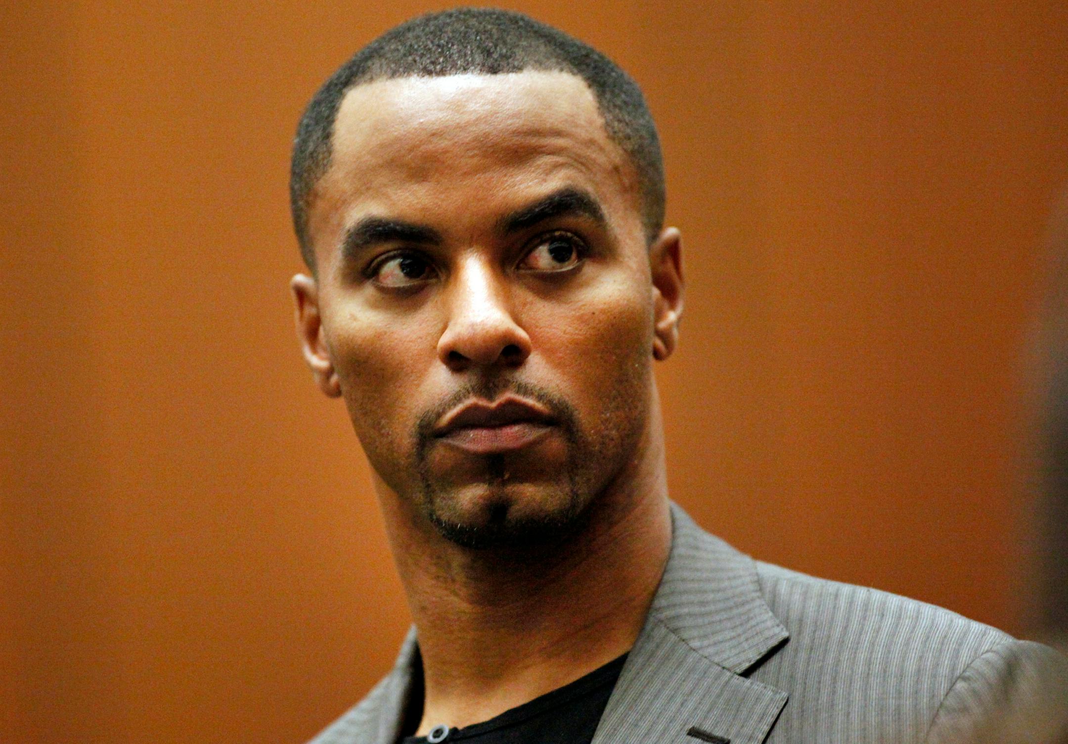 FILE - In this Feb. 20, 2014, file photo, former NFL safety Darren Sharper appears in Los Angeles Superior Court in Los Angeles.