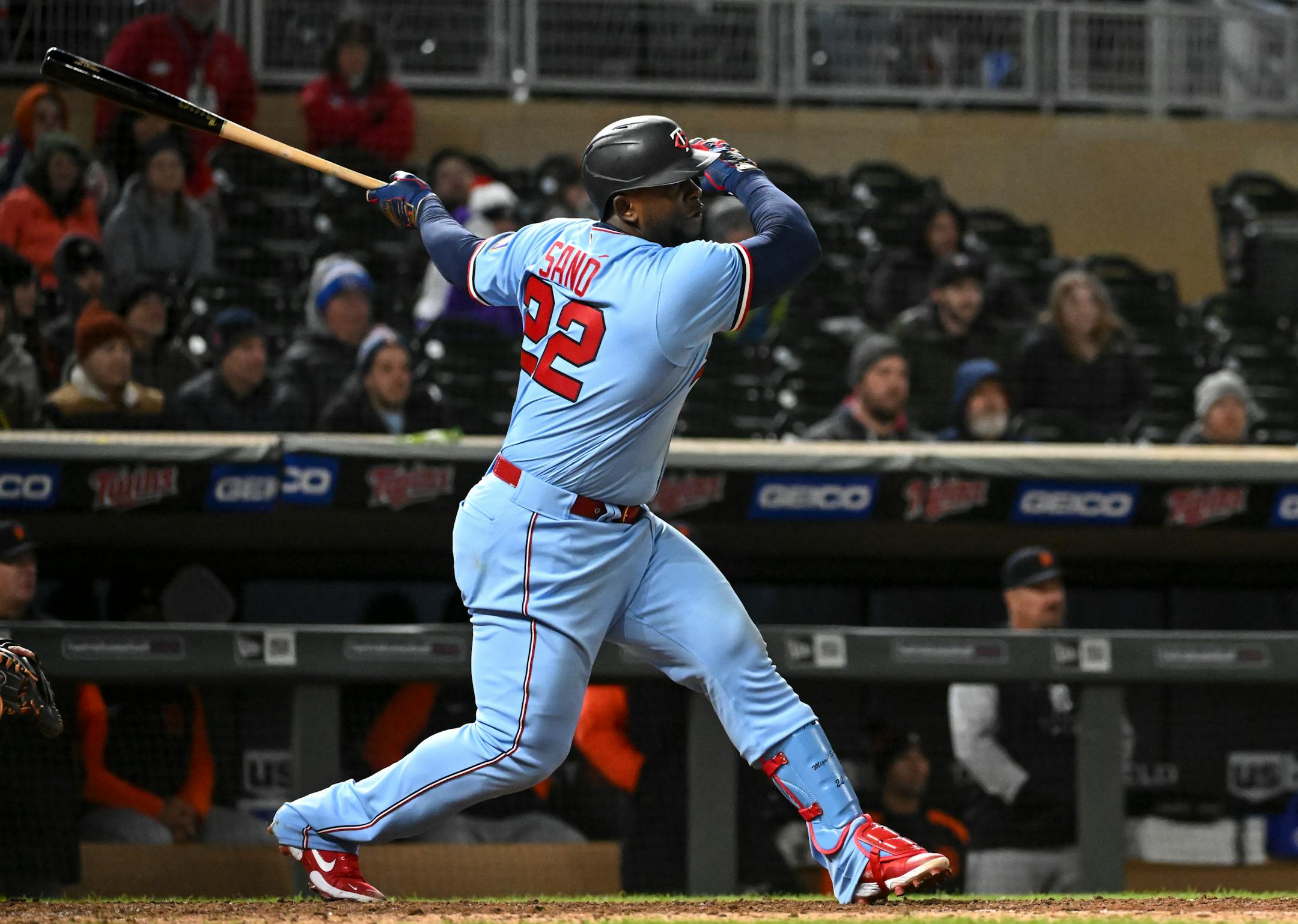 Minnesota Twins first baseman Miguel Sano (22) hits a single, leading ultimately to two runs and a walk-off 5-4 victory after a throwing error by Detroit Tigers catcher Eric Haase (13) in the bottom of the ninth inning.