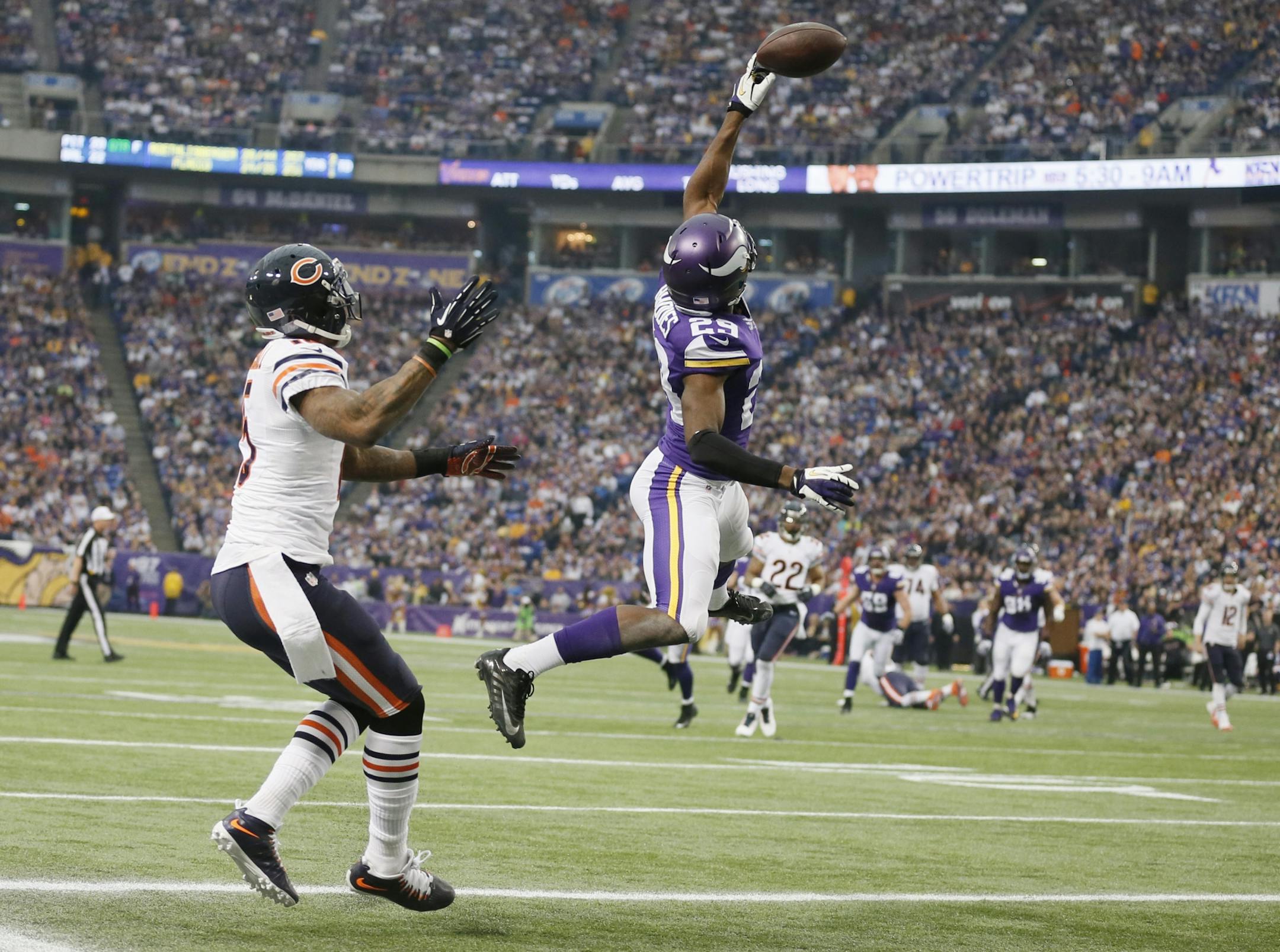 Minnesota Vikings cornerback Xavier Rhodes (29) tipped a pass away from Chicago Bears wide receiver Brandon Marshall (15) in the third quarter during NFL action between the Minnesota Vikings and the the Chicago Bears at Mall of America Field Sunday December 01, 2013 in Minneapolis , MN .Minnesota beat Chicago 23-20 in overtime.
