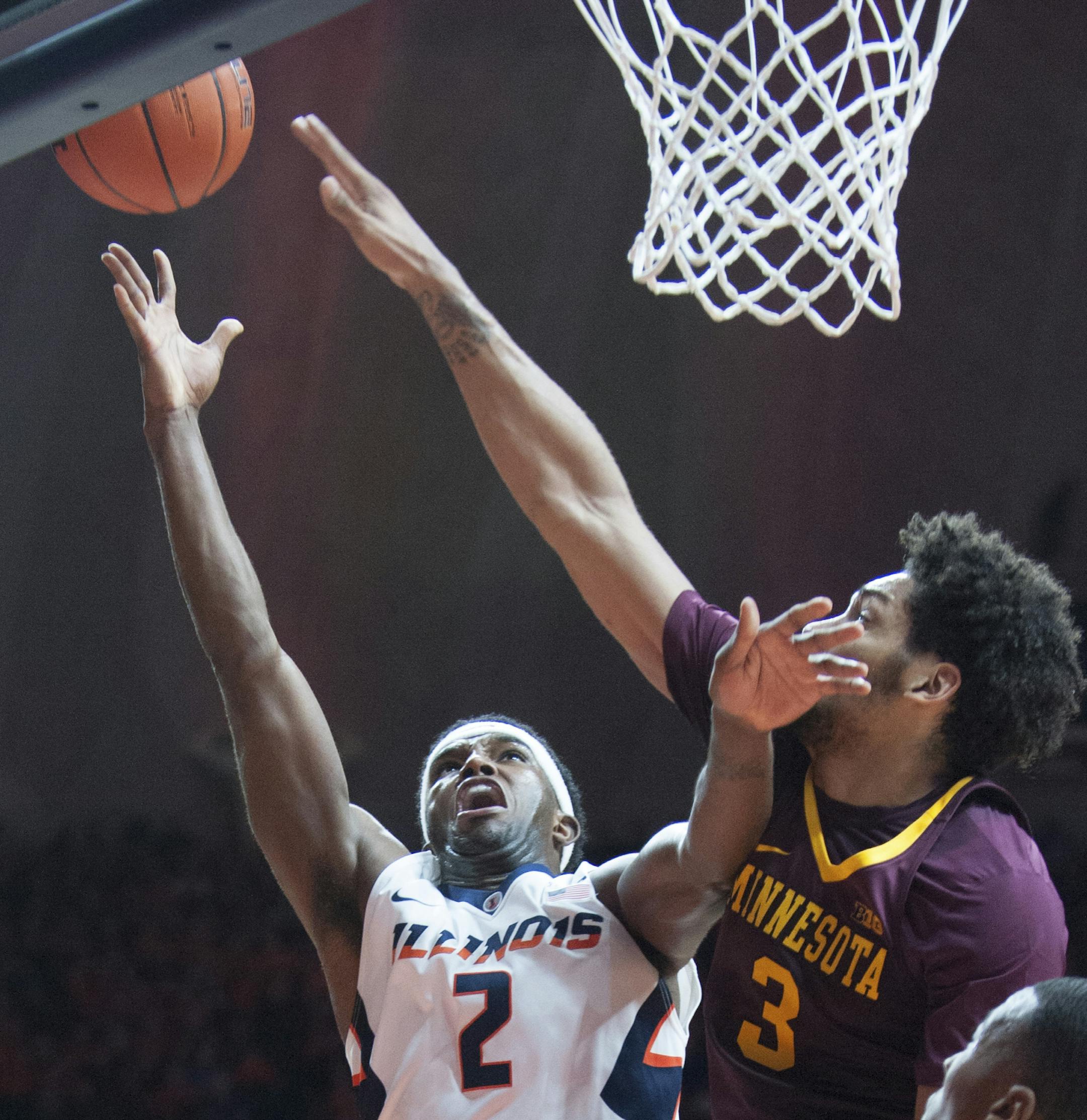 Illinois' forward Kipper Nichols (2) and Minnesota's forward Jordan Murphy (3 )during an NCAA college basketball game in Champaign, Ill., on Saturday, Feb. 4, 2017.(AP Photo/Robin Scholz)