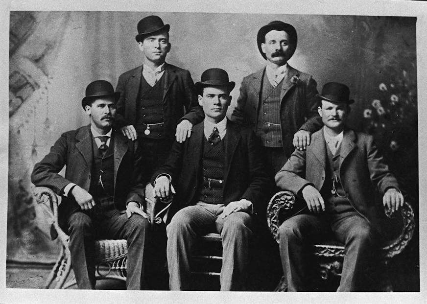 This image provided by the Nevada Historical Society shows the famous group portrait taken in Fort Worth, Texas shortly after Butch Cassidy and his gang robbed the Einnemucca, Nev., bank in 1900. They sent the photo to the bank with a thank you note. Shown are Bill Carver, top left, the Sundance Kid, bottom left, and Butch Cassidy, bottom right. The other two members of the gang are not identified. A collector of rare books and documents has obtained a manuscript with new evidence that Butch Cas