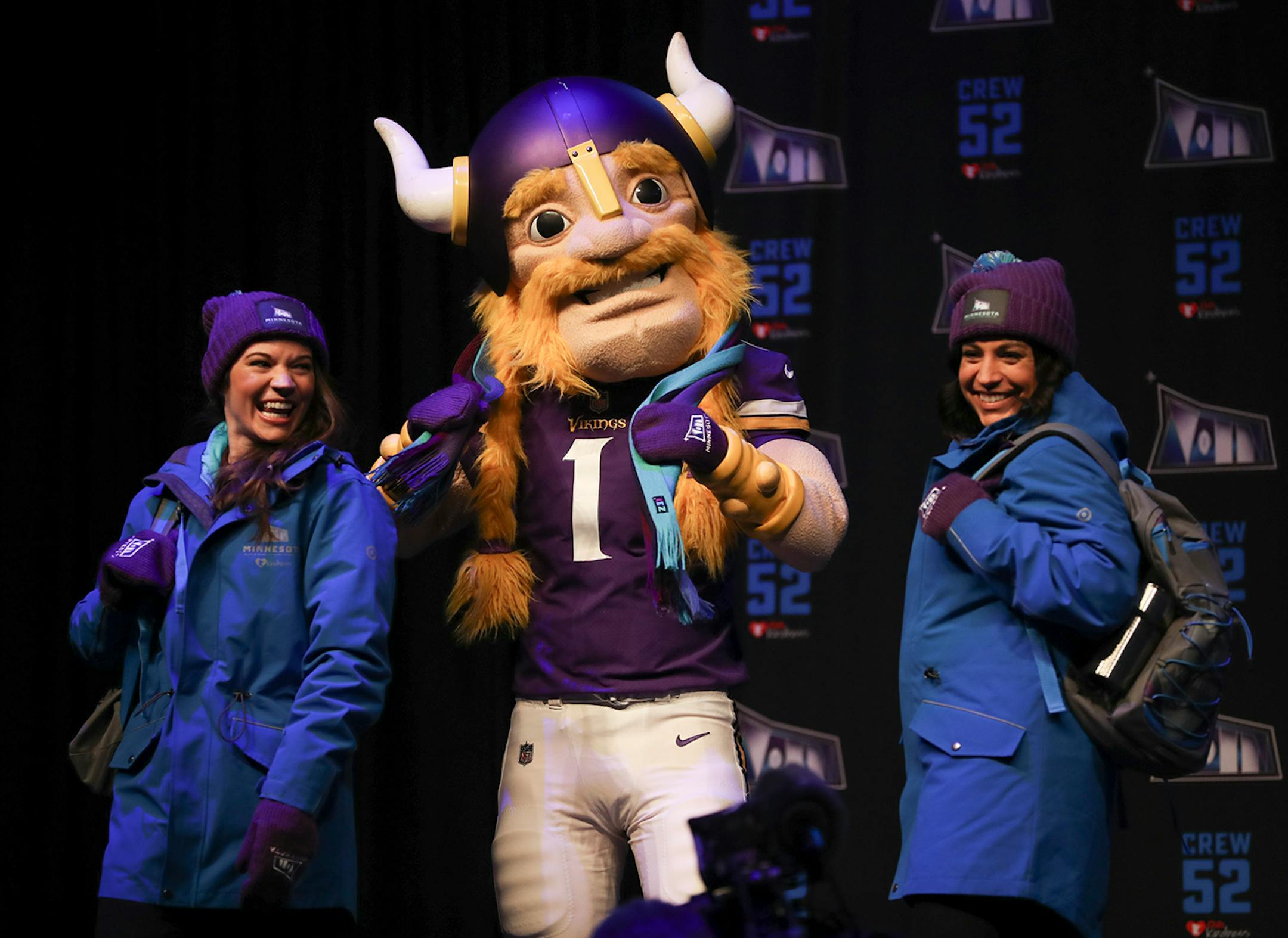 Volunteers, joined by the Vikings mascot, Viktor, modeled some of the apparel that will be provided to the 10,000 Super Bowl LII volunteers during the orientation meeting Sunday afternoon.