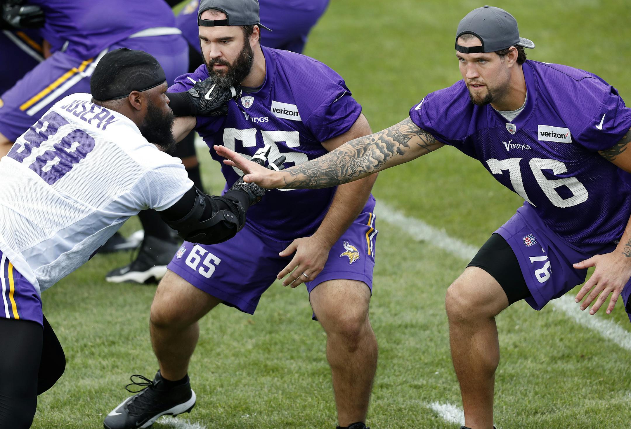 Linval Joseph (98) was blocked by John Sullivan (65) and Alex Boone (76) during the morning walk through. ] CARLOS GONZALEZ cgonzalez@startribune.com - July 29, 2016, Mankato, MN, Minnesota State University, Mankato, Minnesota Vikings Training Camp