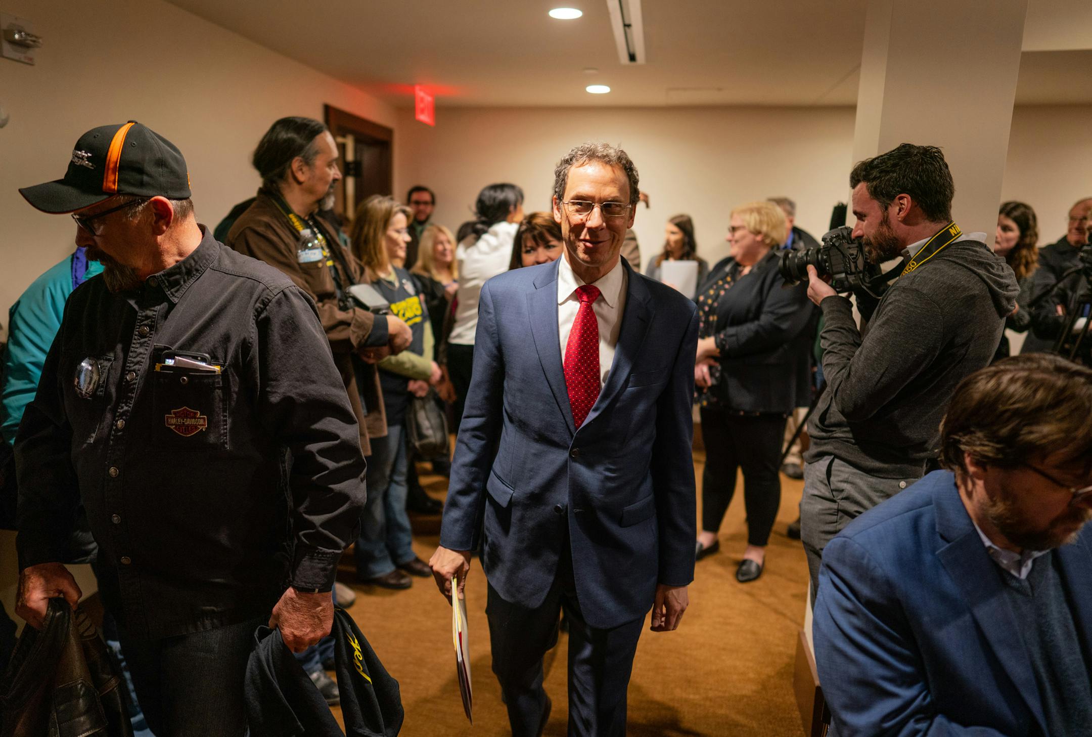 Sen. Ron Latz filed past gun rights advocates and members of the press to introduc two companion pieces of gun control legislation. ] MARK VANCLEAVE &#xa5; Gun rights advocates descended on the state capitol to lobby legislators on the same day State Sen. Ron Latz introduced two companion pieces of gun control measures Thursday, Jan. 24, 2019.