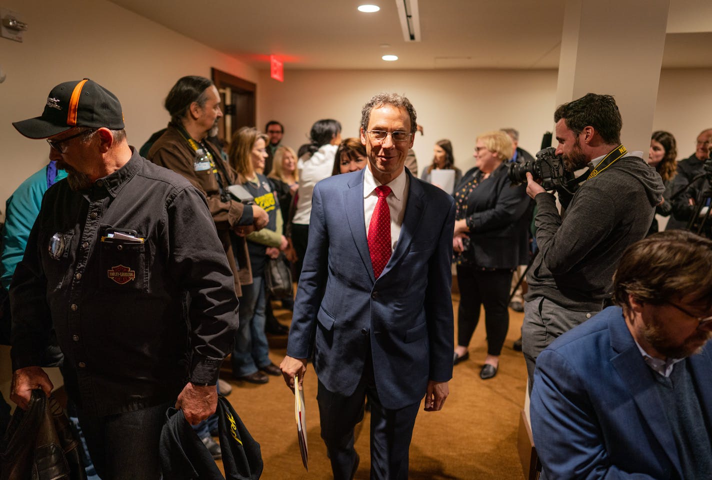 Sen. Ron Latz filed past gun rights advocates and members of the press to introduc two companion pieces of gun control legislation. ] MARK VANCLEAVE &#xa5; Gun rights advocates descended on the state capitol to lobby legislators on the same day State Sen. Ron Latz introduced two companion pieces of gun control measures Thursday, Jan. 24, 2019.