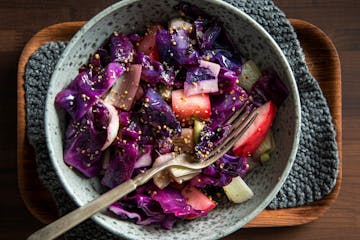 Warm Red Cabbage Salad with Apples and Mustard is a colorful fall meal. Recipe by Beth Dooley, photo by Mette Nielsen, Special to the Star Tribune