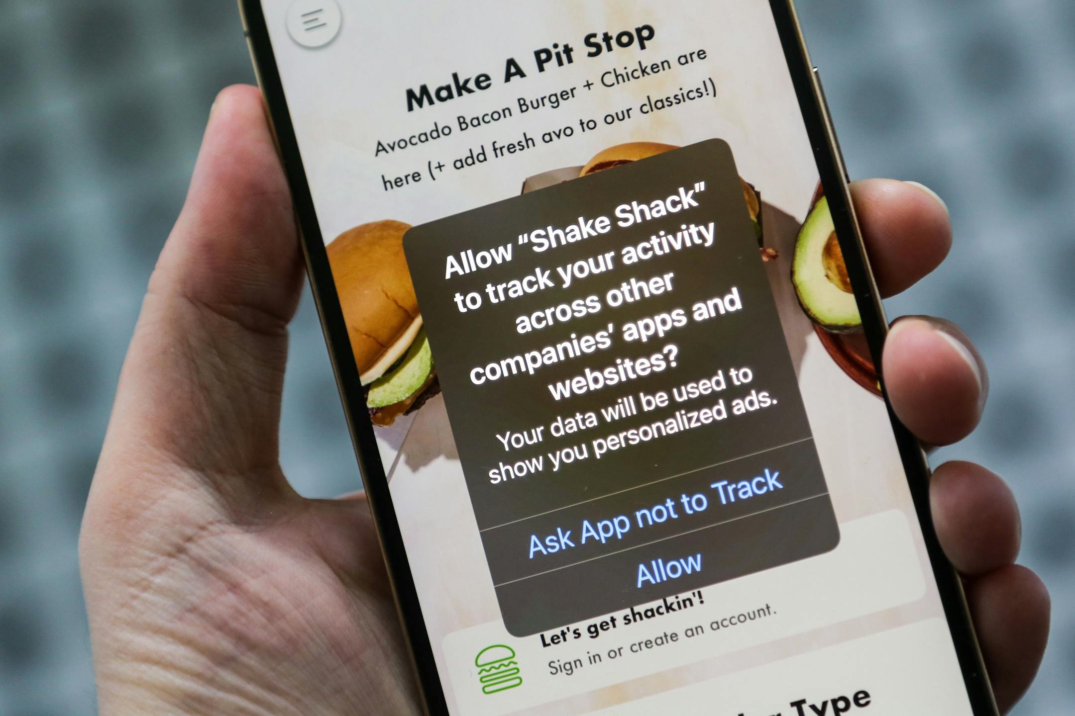 The Shake Shack app, like all iPhone apps, now has to seek your permission to track your phone for marketing purposes. MUST CREDIT: Washington Post photo by Geoffrey Fowler.