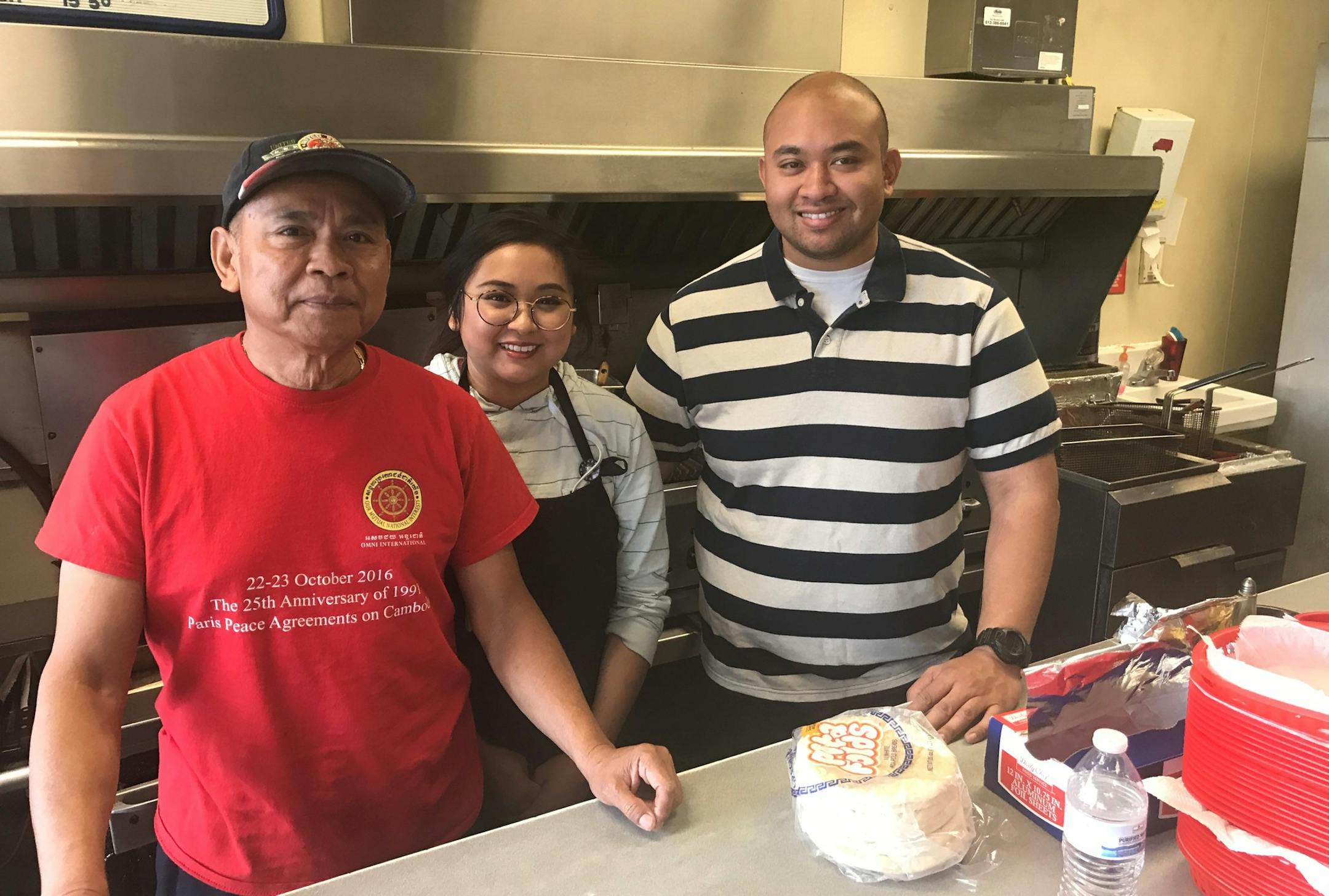 Sophal Nhep, a Cambodian immigrant, got an 11th-hour extension of his lease last Friday for his Best Steak & Gyros restaurant at Franklin and Chicago avenues after 26 years.
Also pictured are Nhep's children, Christina and Nick, who work elsewhere.