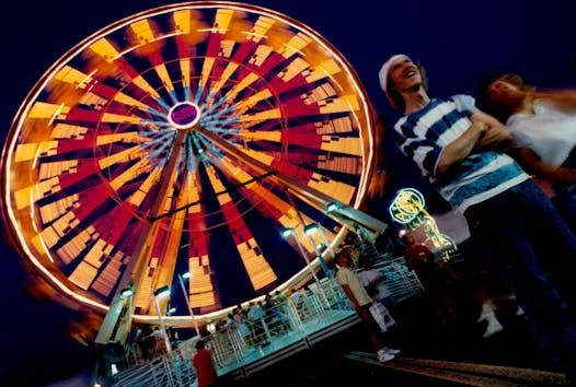Sept. 2, 1991 — Thanks to its illuminated rides, the Midway comes alive after dark.