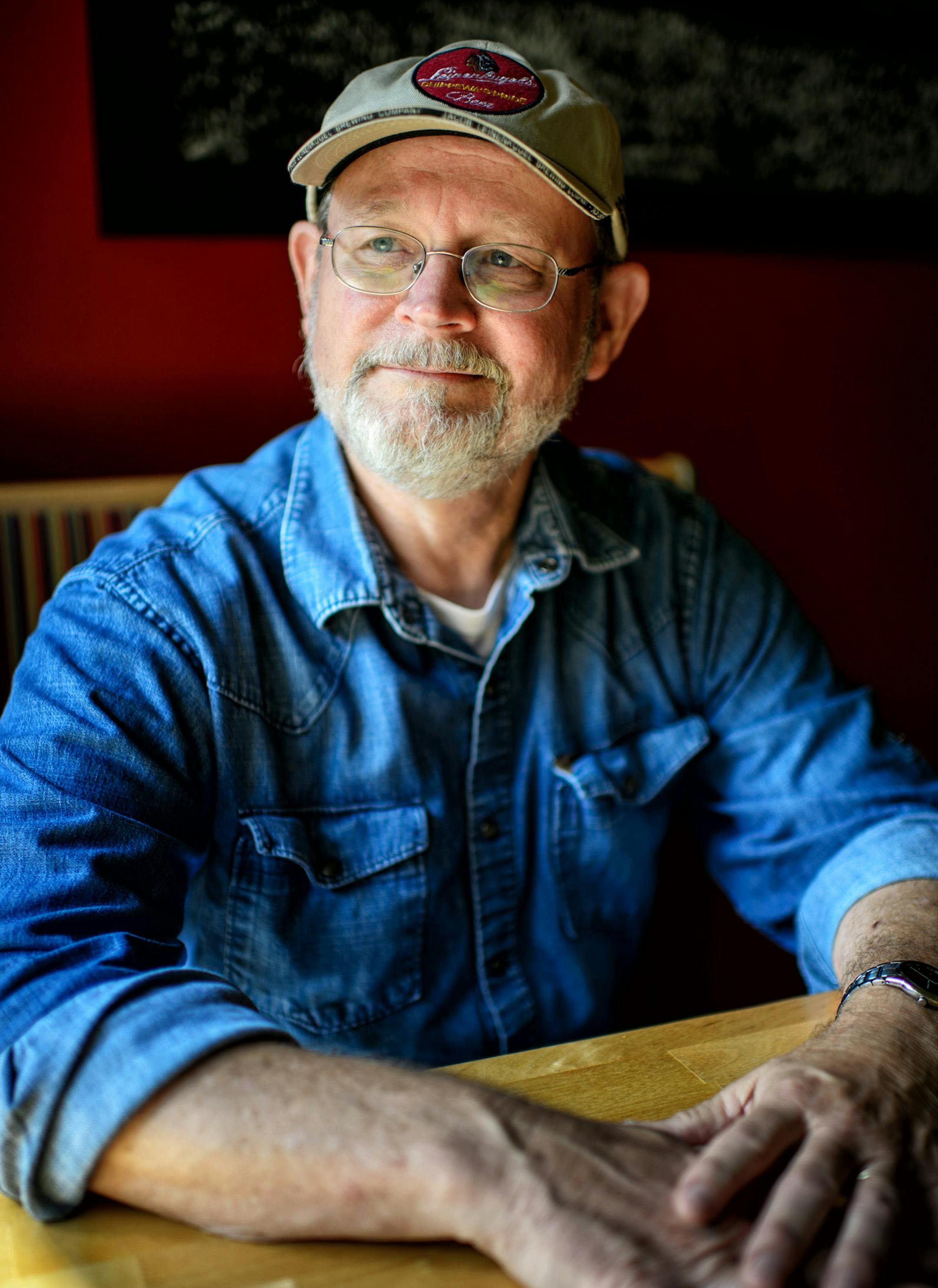 Author William Kent Krueger sat in his favorite seat where he does his writing, at the Como Park Grill, St. Paul. ] Thursday, July 31, 2014. GLEN STUBBE * gstubbe@startribune.com