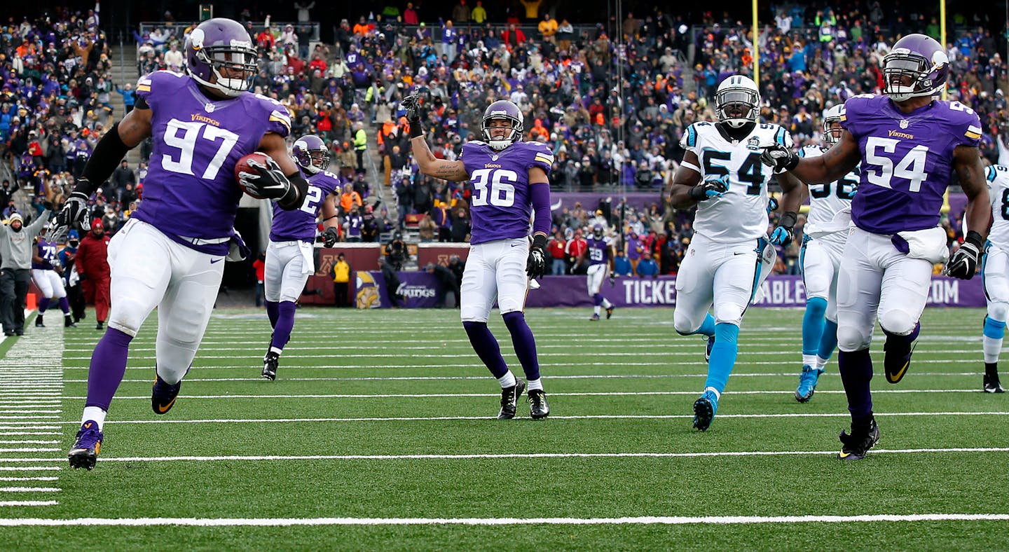 Everson Griffen (97) returned a blocked punt 43-yards for a touchdown in the second quarter. ] CARLOS GONZALEZ cgonzalez@startribune.com - November 30, 2014, Minneapolis, Minn., TCF Bank Stadium, NFL, Minnesota Vikings vs. Carolina Panthers