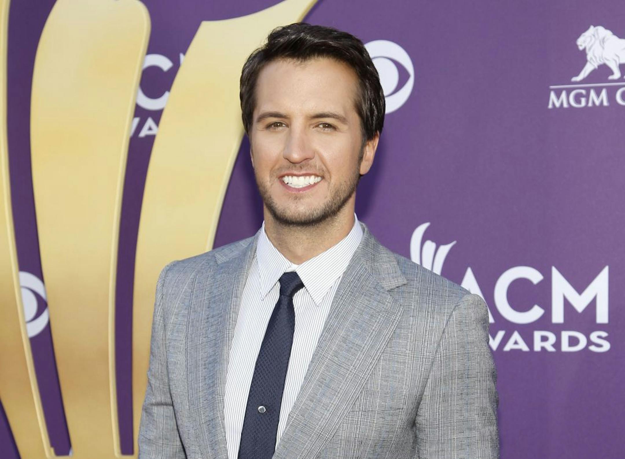 FILE - This April 1, 2012 file photo shows country singer Luke Bryan at the 47th Annual Academy of Country Music Awards in Las Vegas. Bryan is joining Blake Shelton to co-host the 2013 Academy of Country Music Awards. The Academy announced Tuesday, Jan. 8, 2013, this year�s show will be held April 7. Bryan replaces Reba McEntire, who served as host for more than a decade before stepping aside to concentrate on her new sit-com �Malibu Country.�