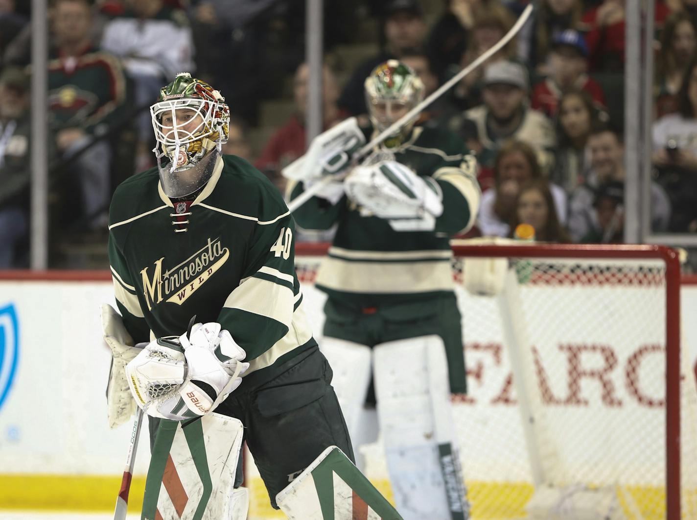 Wild goalie Devan Dubnyk skated to the bench after being replaced by Wild goalie Darcy Kuemper after allowing a third St. Louis Blues goal in the second period Sunday night.