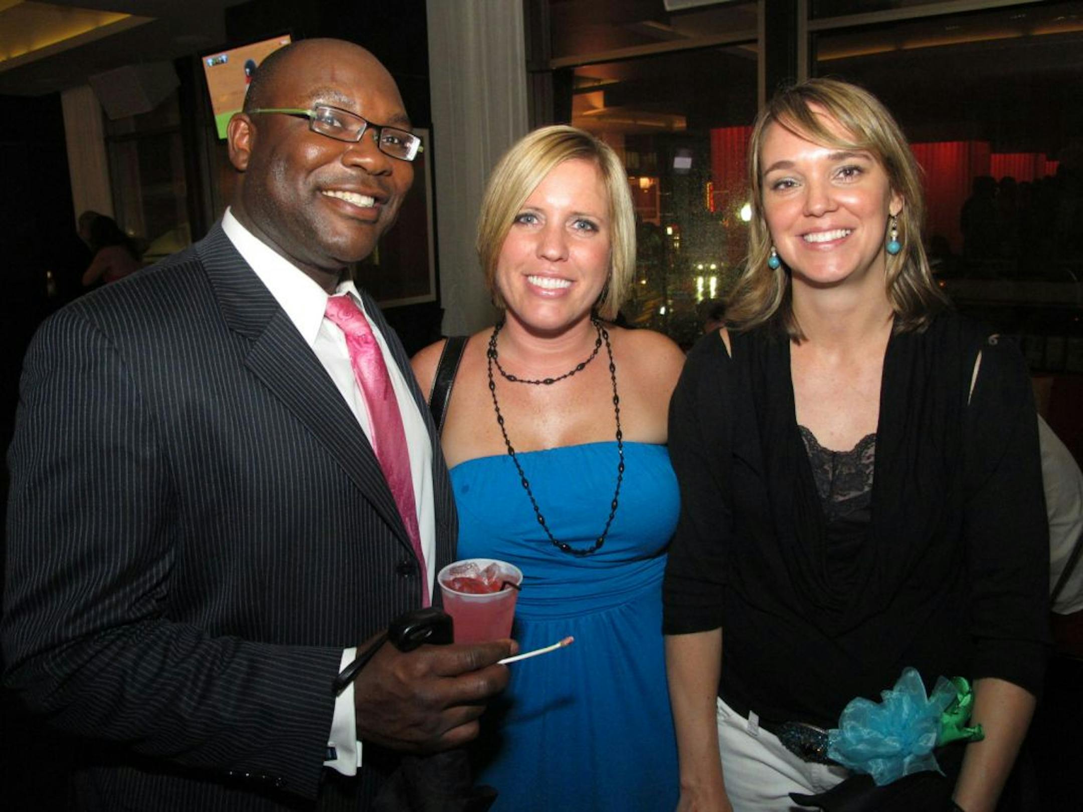 The second annual Firefighters for Healing benefit at Seven Sushi Ultra Lounge raised money for children with burn injuries. James Springer II, Tammy Reno and Michele Sussner.