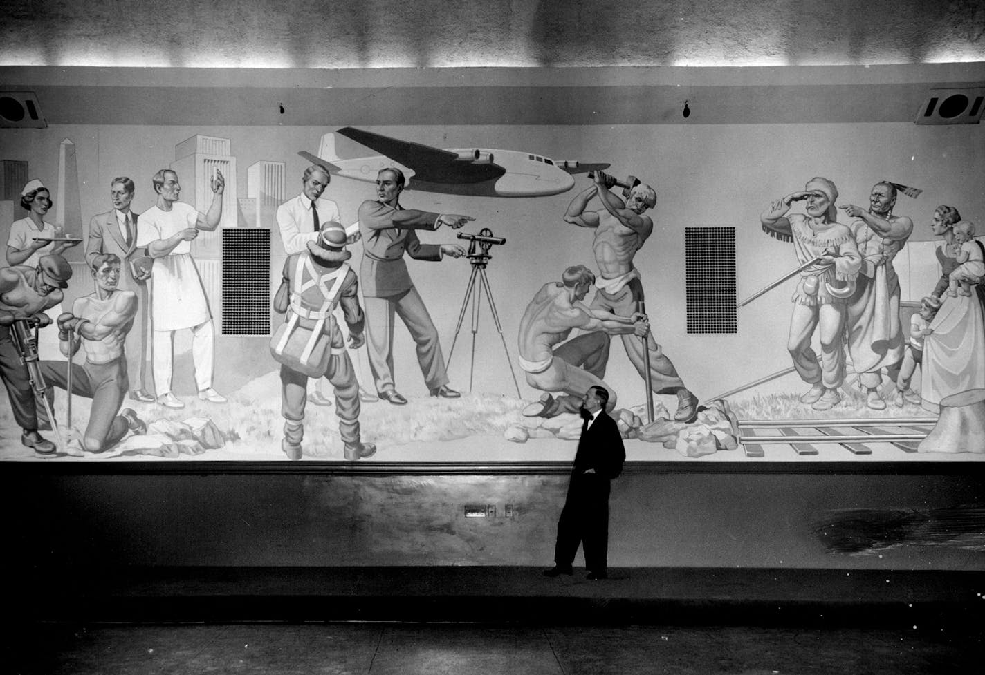 November 30, 1947 MURAL COMPLETES NICOLLET HOTEL REDECORATING PROJECT - Denicting the progress of Minneapolis from pioneer days to the ***** shown above covers an entire wall of the main ballroom of Nicollet hotel. ***** painting by Gustav Krollman, Minneapolis artist, are 71/2 feet high. ***** in length. Bruce Sifford Studio; Minneapolis Star Tribune ORG XMIT: MIN2014112319283153