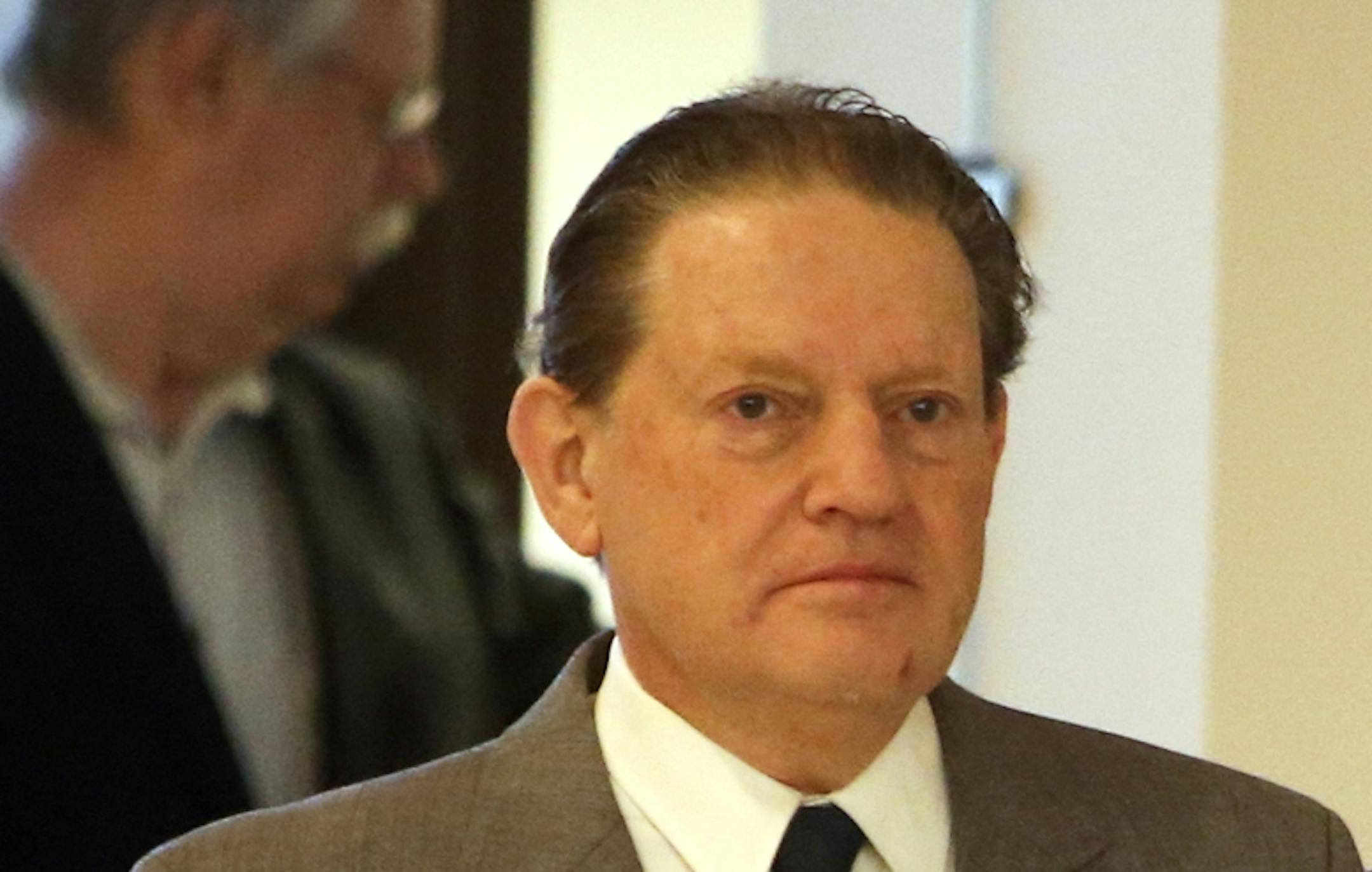 Byron Smith headed into the Morrison County Courthouse in Little Falls during his trial in April 2014.