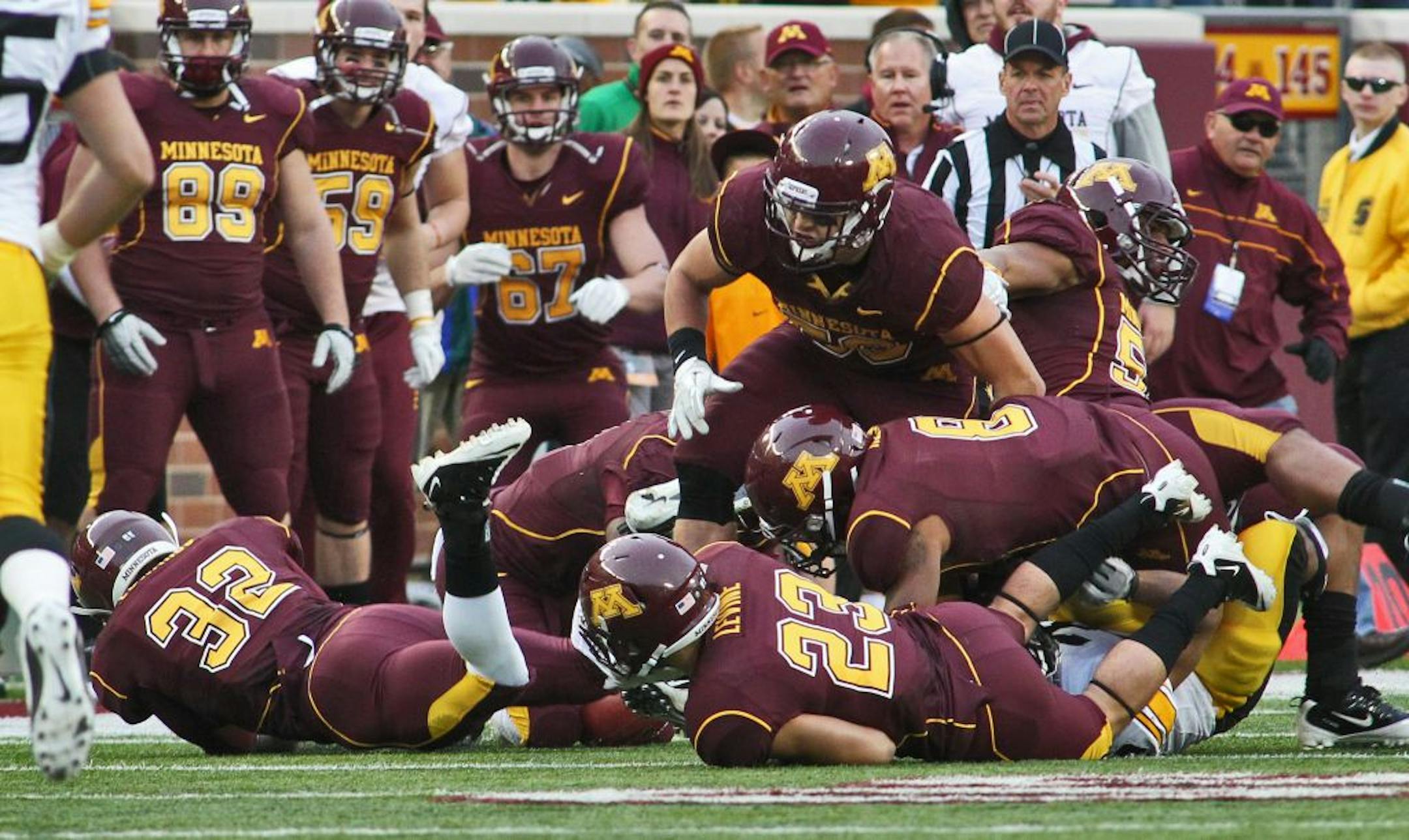 Minnesota Gophers vs. Iowa Hawkeyes football. Minnesota won 22-21. Gophers players fell on a free ball as a result of a 4th quarter on-side kick, giving the Gophers offense a chance to drive for the final winning touchdown.