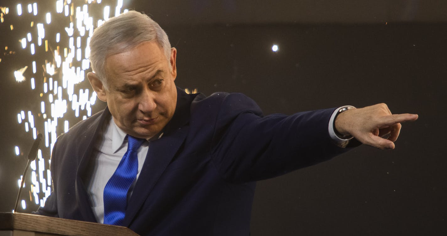 Prime Minister Benjamin Netanyahu holds an election-night rally for his Likud party in Tel Aviv, Israel, April 9, 2019. With nearly all of the votes counted, Likud had a clear advantage in being able to form a governing coalition, putting Netanyahu in position to win a fourth consecutive term in an extremely tight race. (Dan Balilty/The New York Times)