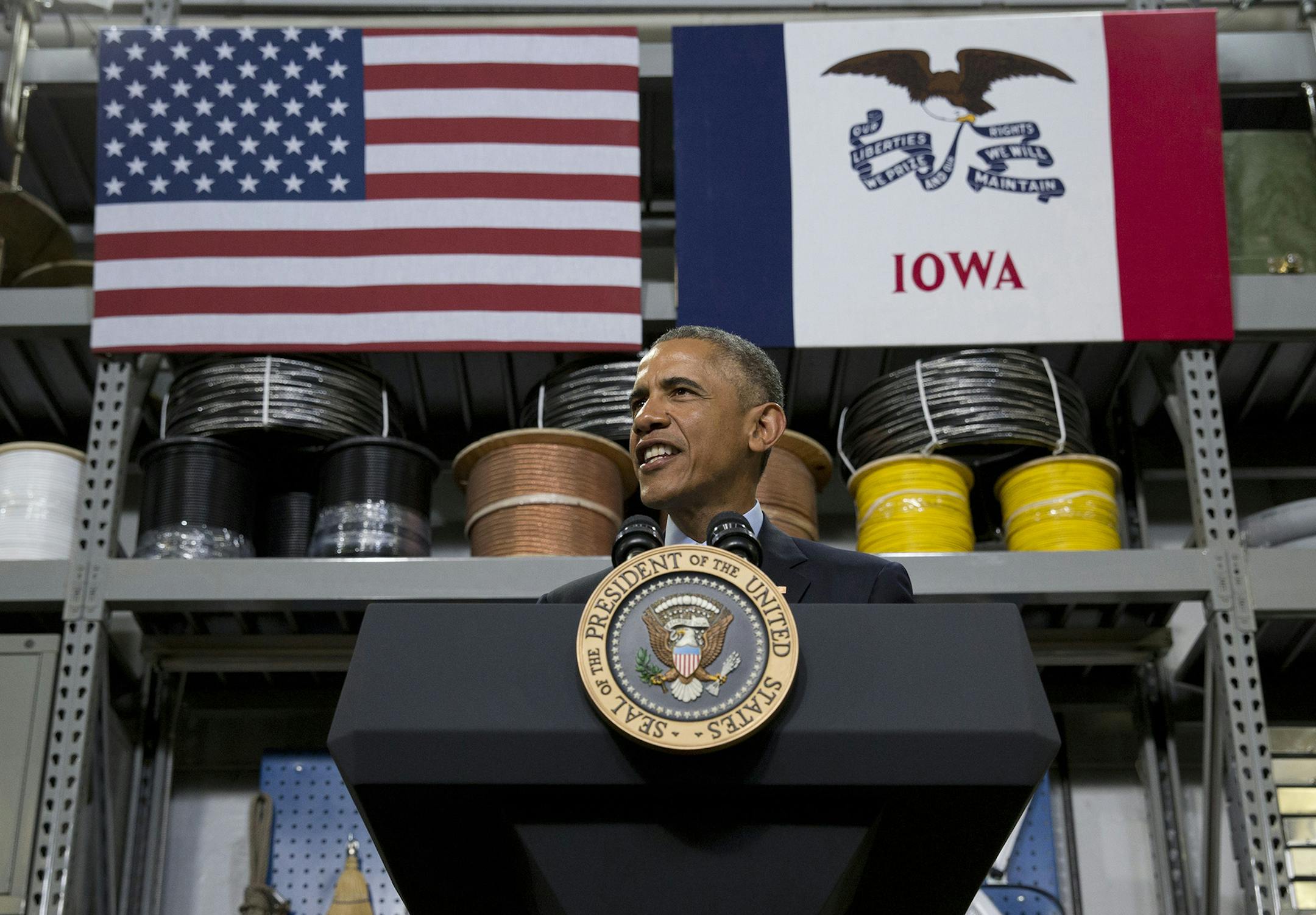President Barack Obama speaks at Cedar Falls Utilities in Cedar Falls, Iowa, Wednesday, Jan. 14, 2015, about steps to increase access to affordable, high-speed broadband across the country. (AP Photo/Carolyn Kaster) ORG XMIT: MIN2015012311204929