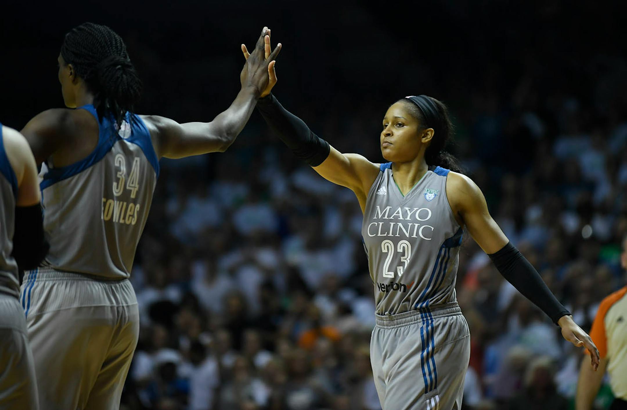 Minnesota Lynx forward Maya Moore (23) celebrated with center Sylvia Fowles (34) after Fowles was fouled in the second half Sunday.