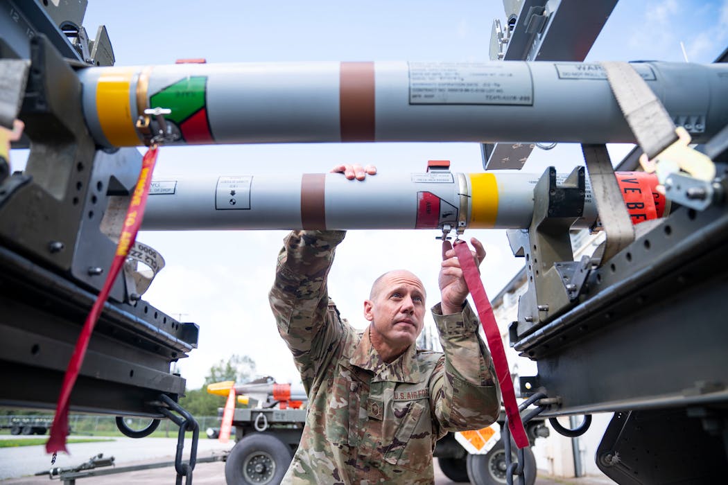 Senior master sergeant Charlie Zobitz demonstrated how to inspect Air Interceptor Missile Nines at the 148th Fighter Wing in Duluth on Monday, Aug. 30, 2021. In the aftermath of the 9/11 terrorist attacks, he helped load missiles onto trailers, inspected them and moved them into position to be loaded into F-16 fighter jets.