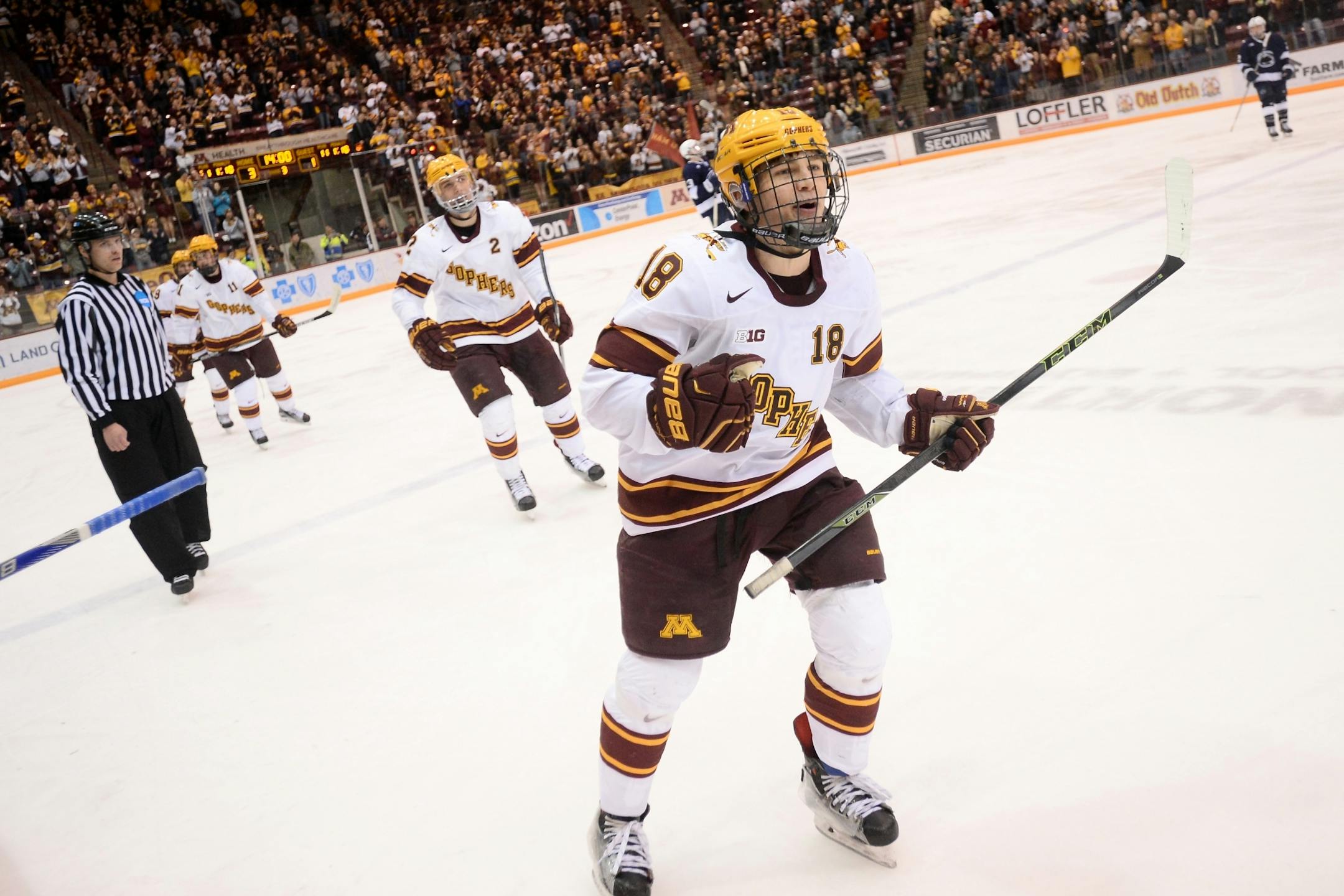 Minnesota Golden Gophers right wing Leon Bristedt (18) celebrated after scoring a goal against the Penn State Nittany Lions in the third period Friday night.