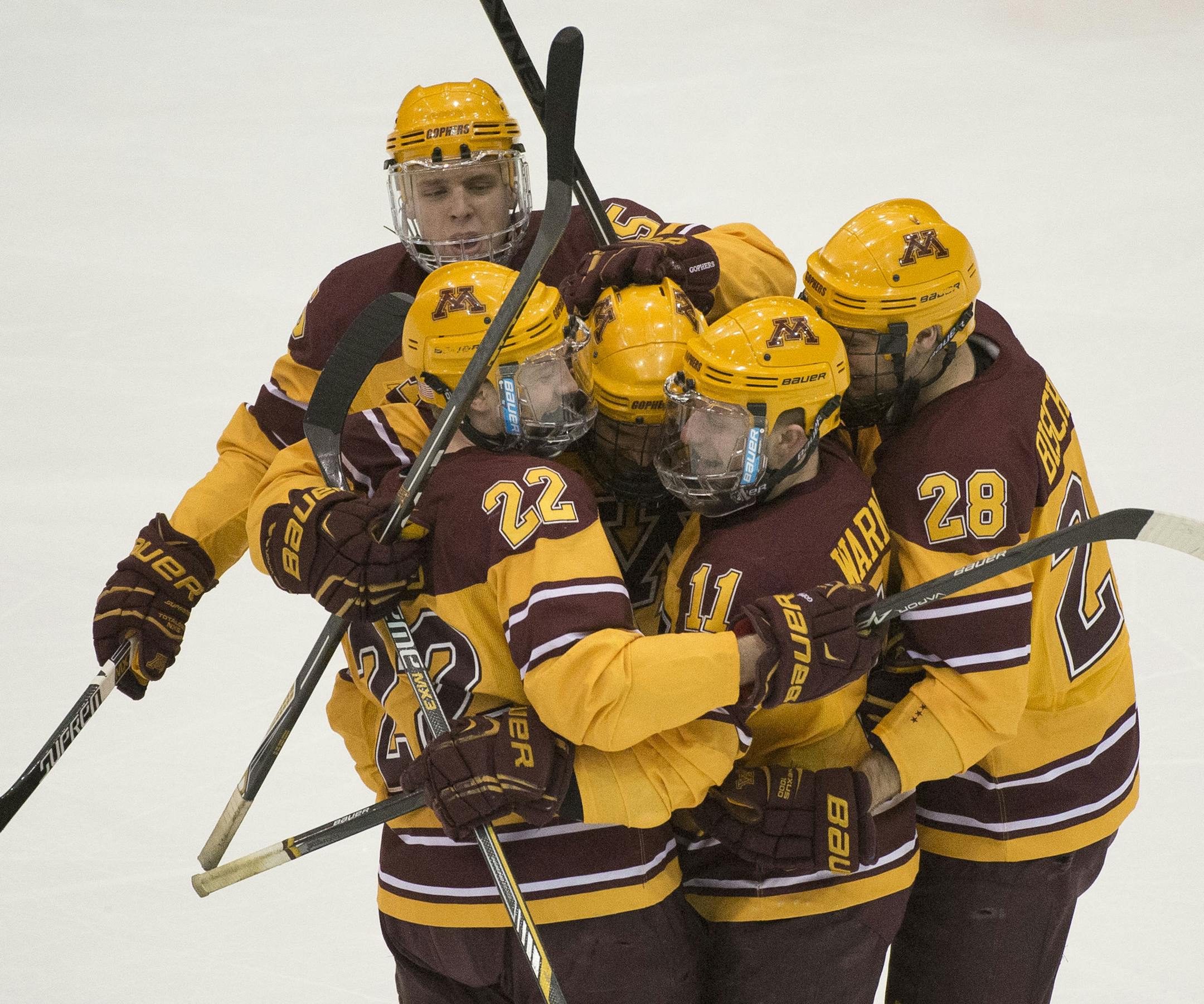 The University of Minnesota Gophers celebrate a goal by Minnesota center Travis Boyd (22) during the first period against Ohio State. ] (Aaron Lavinsky | StarTribune) University of Minnesota men's hockey takes on Ohio State on Saturday, Feb. 7, 2015 at Mariucci Arena.