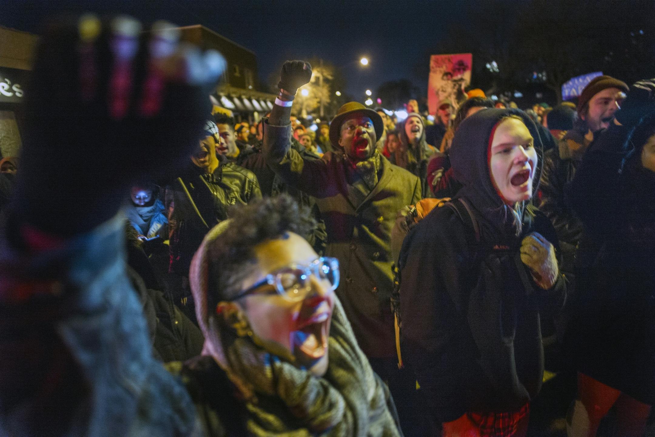 Black Lives Matter protesters who marched from City Hall to Elsie where there was to be a police fundraiser demanded answers in the death of Jamar Clark .