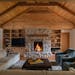 The Rogers family handpicked the fieldstone from their land for the living room fireplace surround. The new-fashioned farmhouse in Avon, Minn., was de