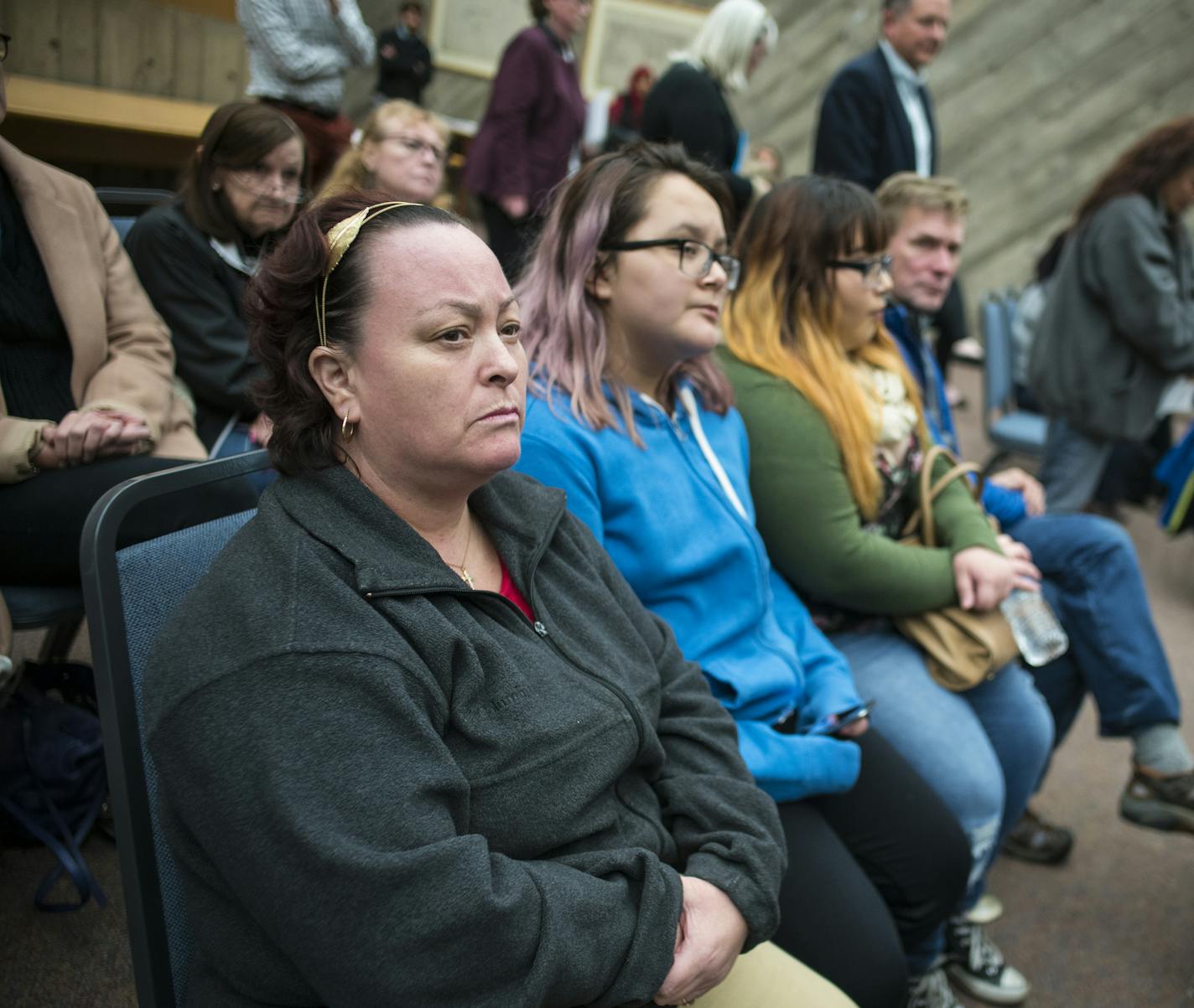 Adela Trejo,far left, sat in a city council meeting to see what would become of her lease. She can now stay until July. ]West St. Paul yanked the rental license of a landlord in late September, effectively leaving residents of 30 units homeless at year's end -- but the landlord is fighting back. City staff call their actions a last resort and allege the property has a history of excessive 911 calls and an unresponsive landlord. Richard Tsong-Taatarii/Richard.tsong-taatarii@startribune.com