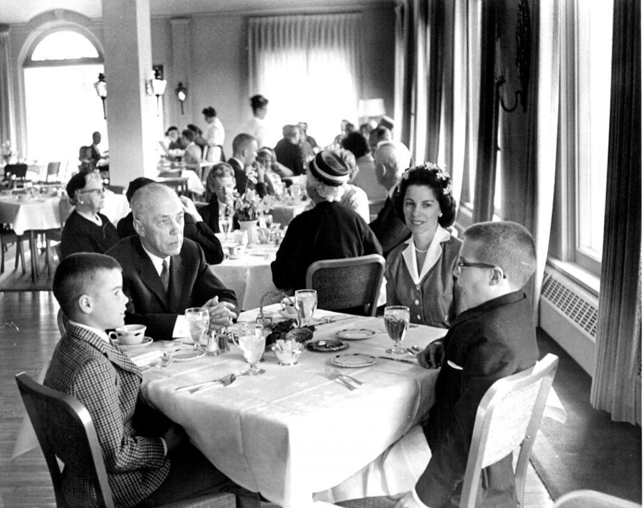 March 28, 1963 Lafayette Club - Dining Room...H. H. Wylie, 2715 W. 28th St. with daughter, Mrs. Barbara Morris, 5912 Ashcroft Ave., Edina and his grandchildren Randy Morris, 10, and Jeff Morris, 12. L to R.: H. H. Wylie is chairman of the membership committee. Powell Krueger, Minneapolis Star Tribune