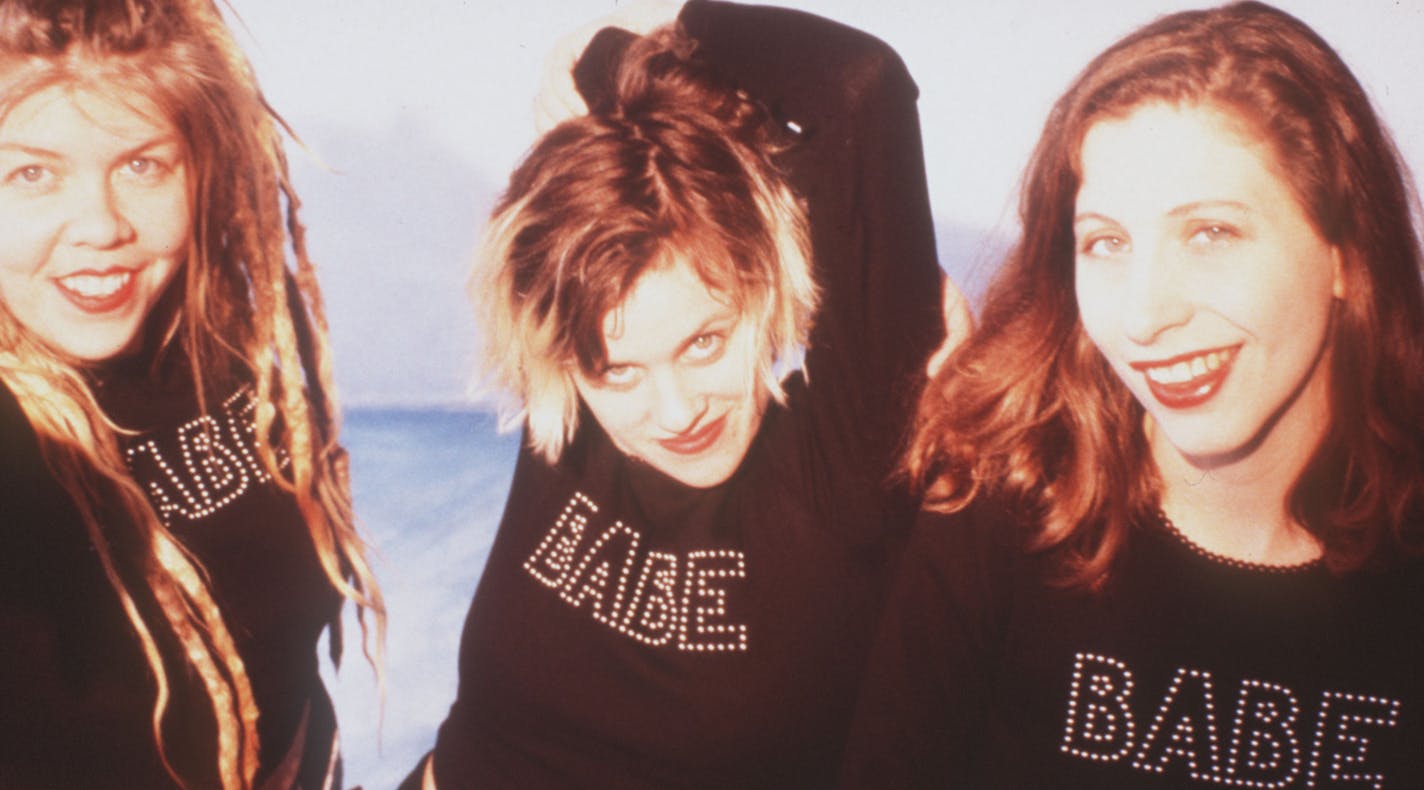 A vintage photo of Babes in Toyland from their Warner Bros. days: From left, Lori Barbero, Kat Bjelland and Maureen Herman.