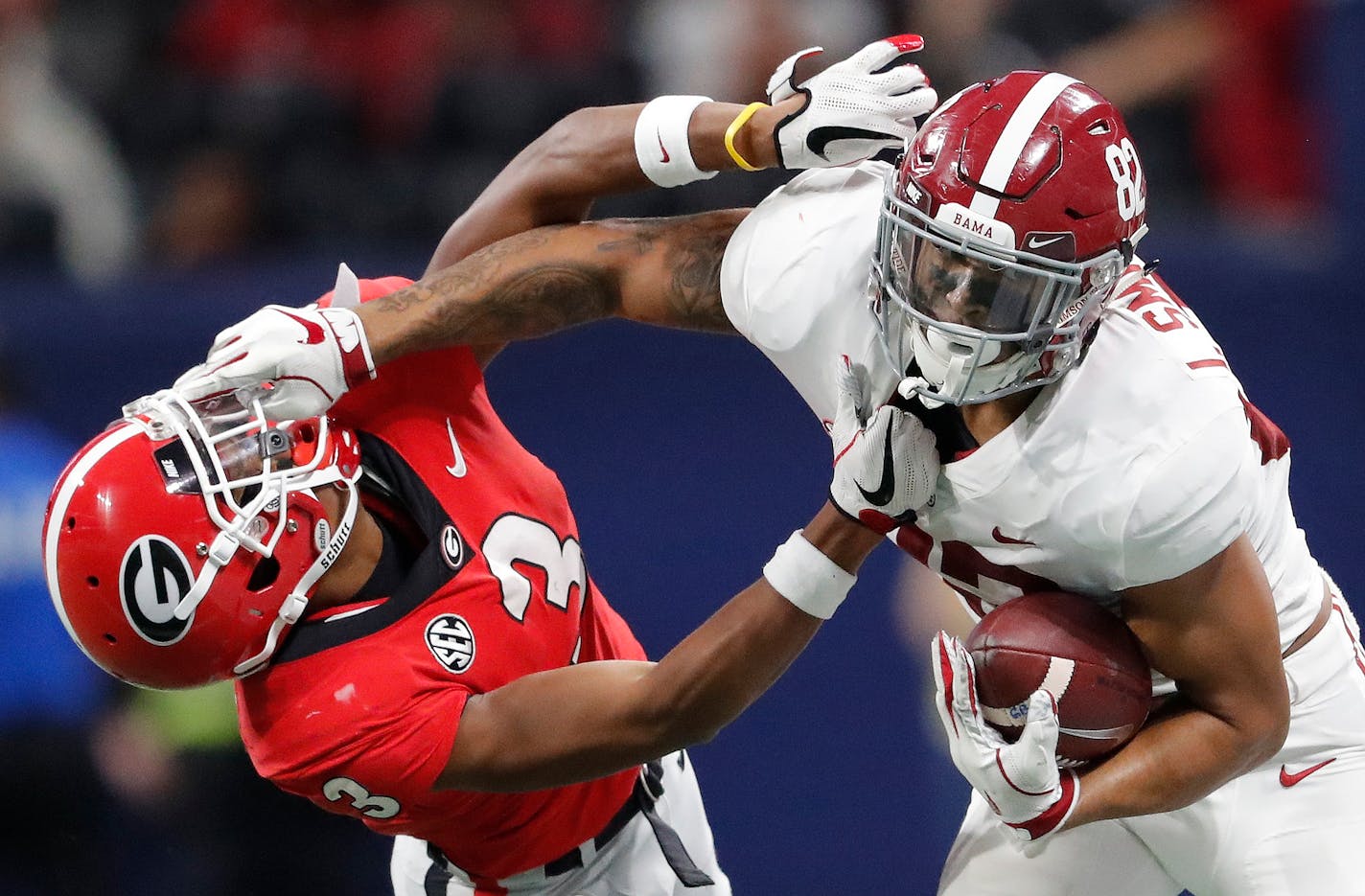 Alabama tight end Irv Smith Jr. hits Georgia defensive back Tyson Campbell