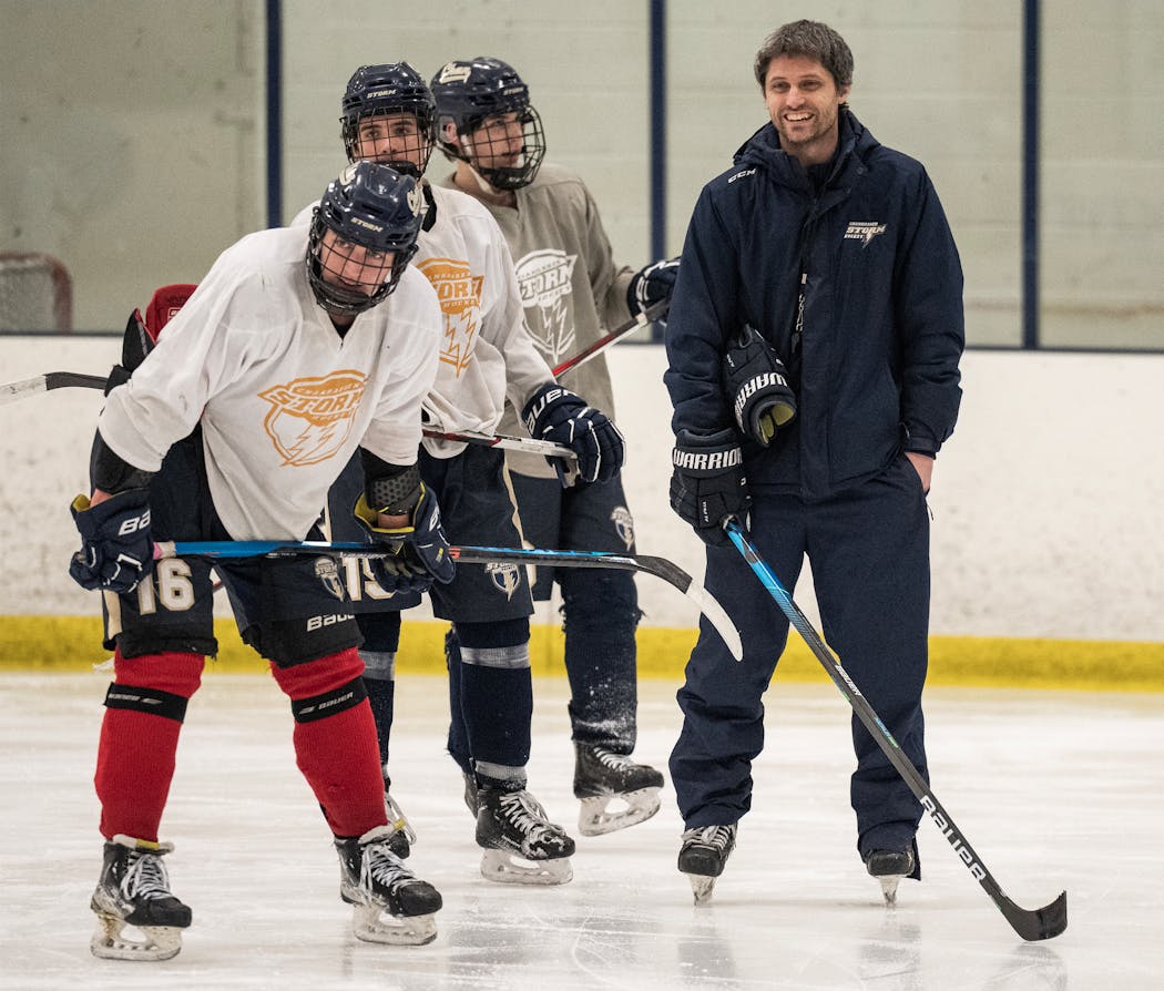 Chanhassen coach Sean Bloomfield oversaw varsity boys hockey practice.