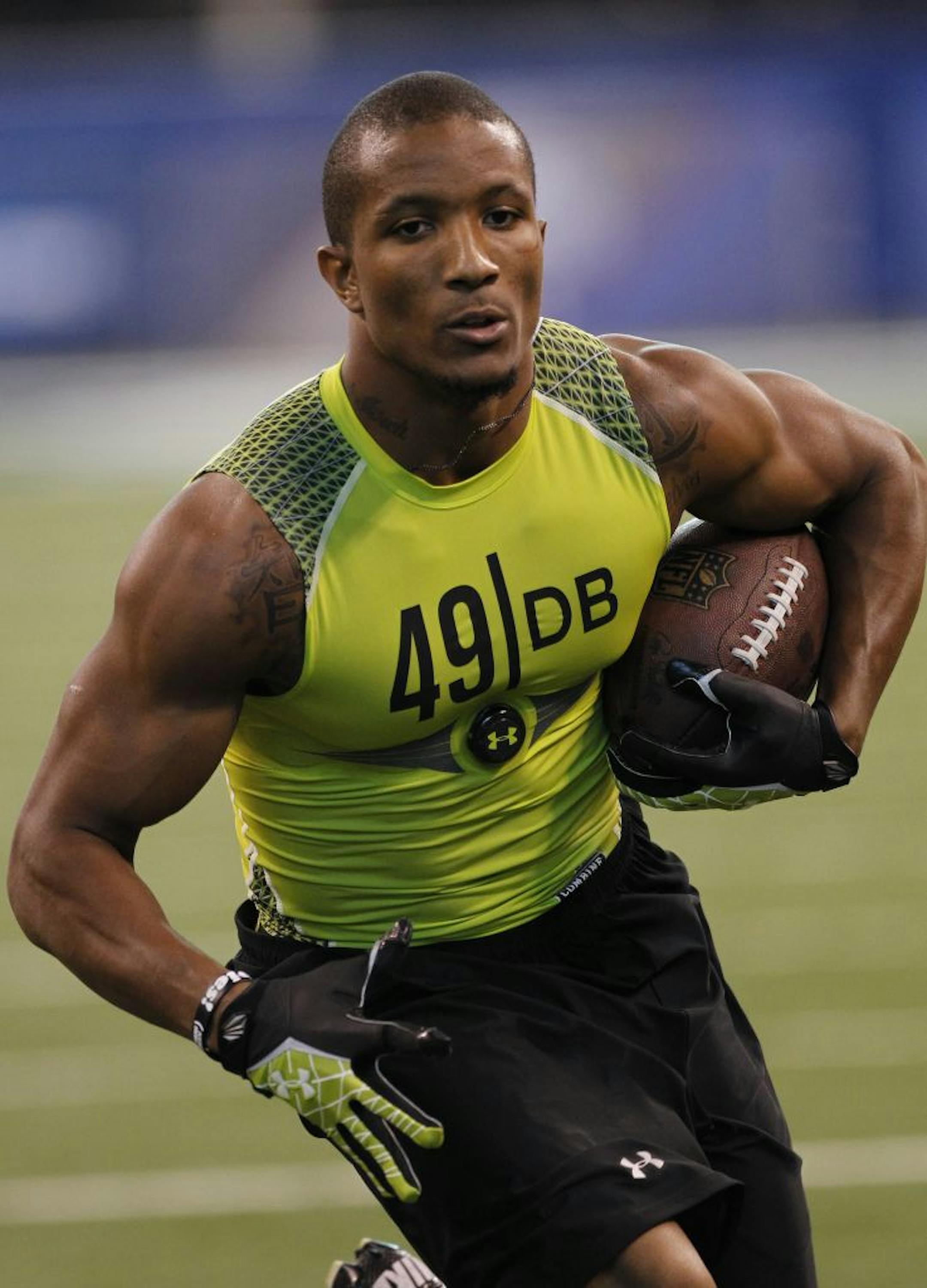 Central Florida defensive back Josh Robinson runs a drill at the NFL football scouting combine in Indianapolis on Tuesday, Feb. 28, 2012.
