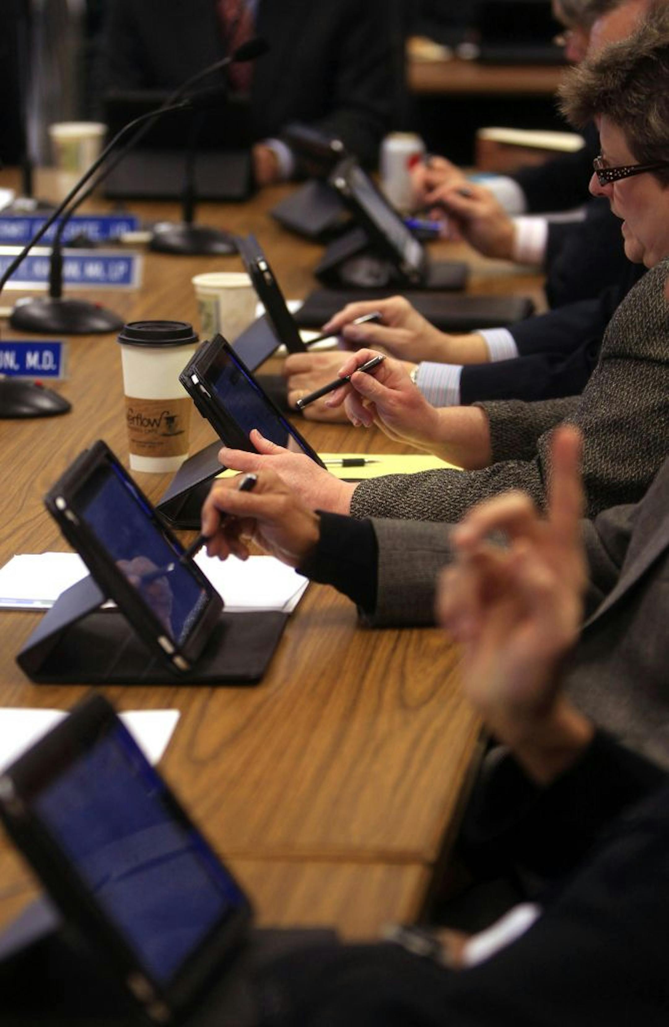 Board members used tablet computers throughout a recent meeting of the Minnesota Board of Medical Practice.