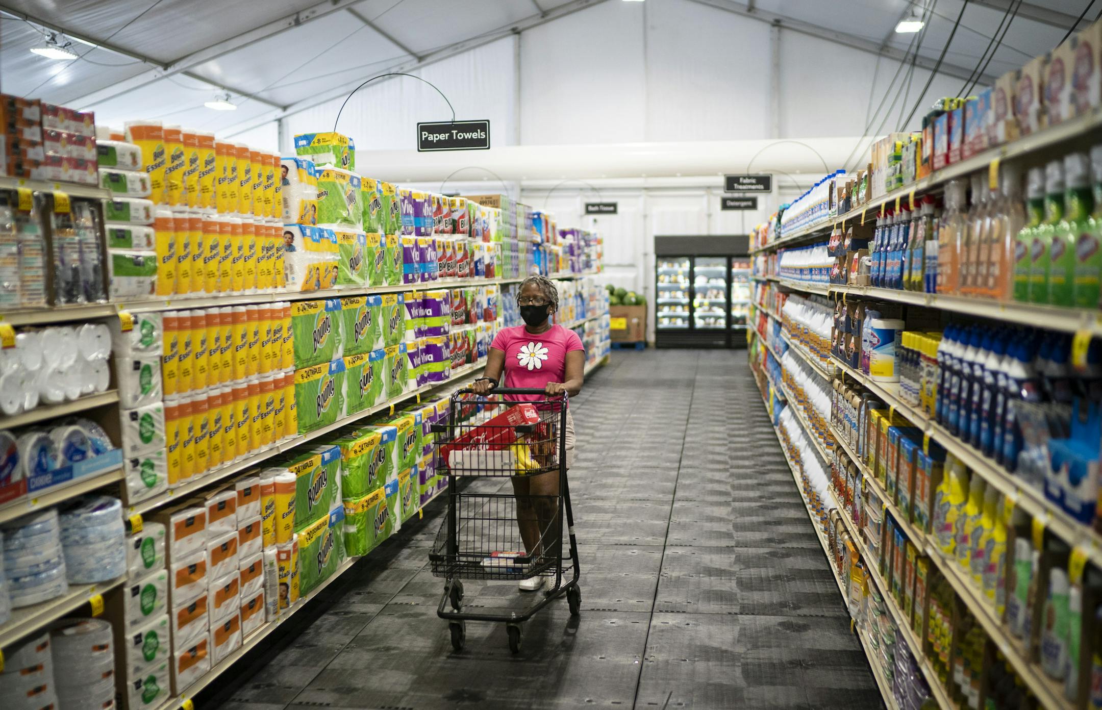 Silverr Adams shopped for the first time at the new temporary tent-like Cub Foods in the parking lot of the Lake Street store in Minneapolis on Wednesday, July 8. The store closed after it was damaged and looted in the aftermath of George Floyd's murder. Adams lives across the street and said it was "devastating" for her to lose her neighborhood grocery store. She had to rely on finding a ride to be able to get groceries.
