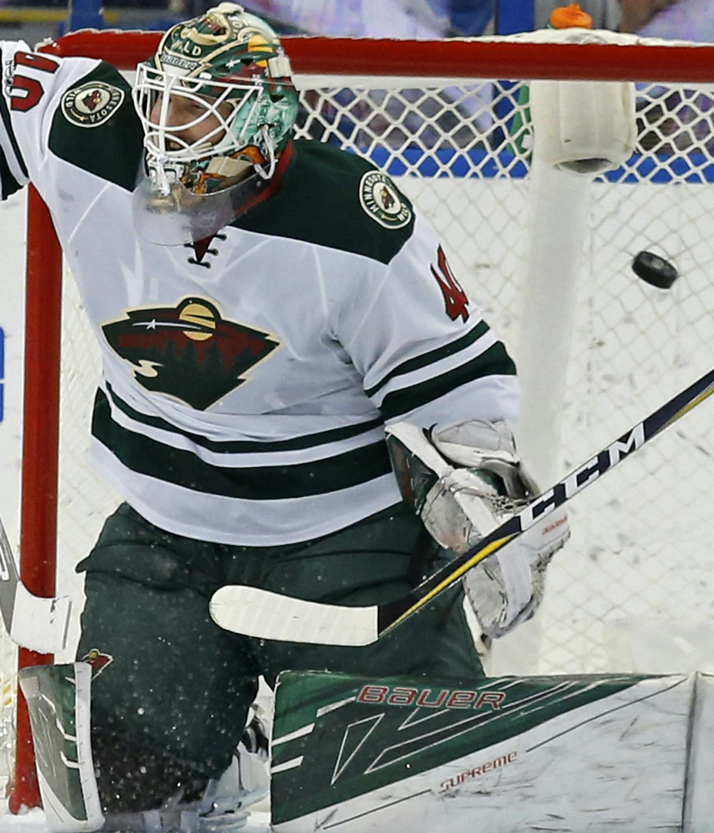 Minnesota Wild goalie Devan Dubnyk allows a goal to Tampa Bay Lightning's Victor Hedman as Adam Erne (73) looks on during the first period of an NHL hockey game Thursday, March 9, 2017, in Tampa, Fla. (AP Photo/Mike Carlson)