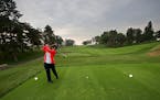 Beverly Collova took some practice swings before teeing off at the Keller Golf Course, Friday, September 25, 2015 in Maplewood, MN. Sensational weathe