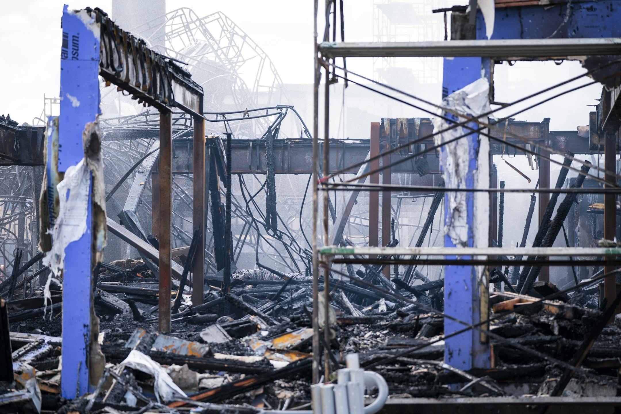 St. Paul firefighters battled a fire at a construction site across from Xcel Energy Center in downtown St. Paul.